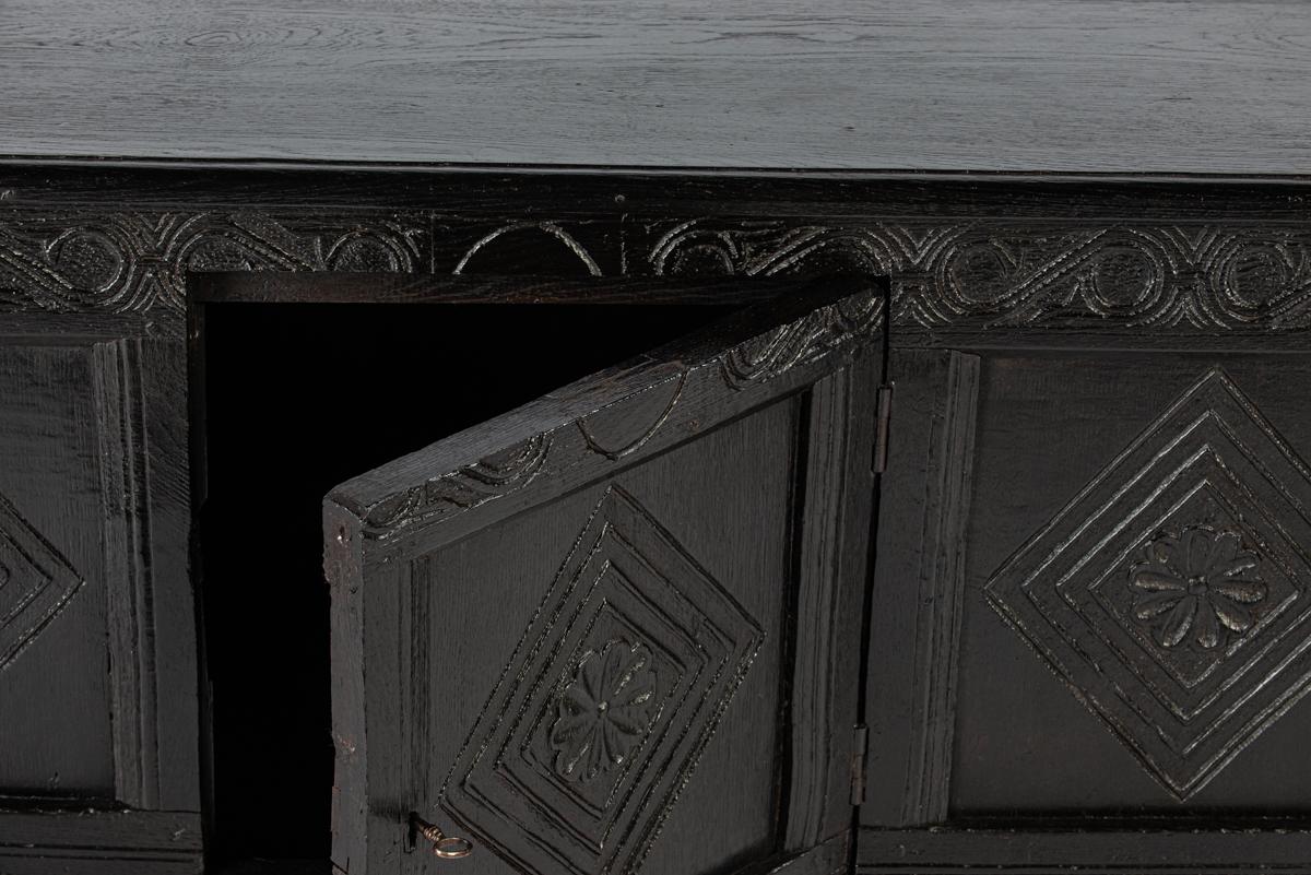 Antique 18th century converted blacked oak and carved English chest or trunk 8