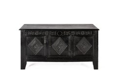 Antique 18th century converted blacked oak and carved English chest or trunk