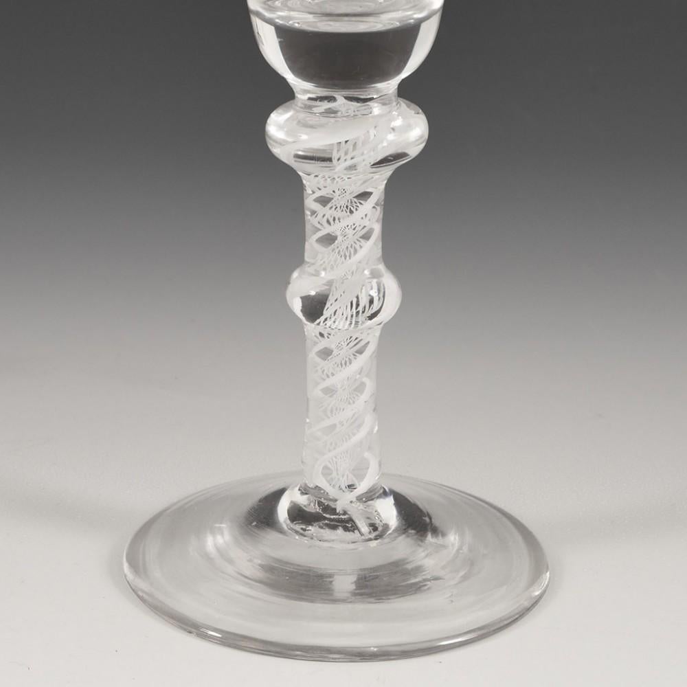 Antique 18th Century Double Knop Opaque Twist Wine Glass, circa 1760

Additional Information: 
Period: George II / George III - c1760
Origin: England
Colour: Clear
Bowl: Bell bowl
Stem: Double knopped double series opaque twist. Annular knop