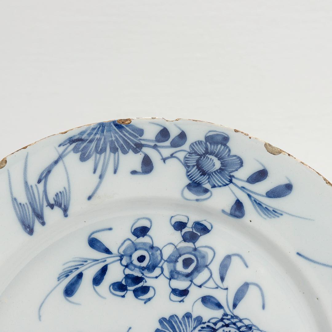 Antique 18th Century Dutch Delft Chinoserie Plate with a Peony Flower In Good Condition In Philadelphia, PA