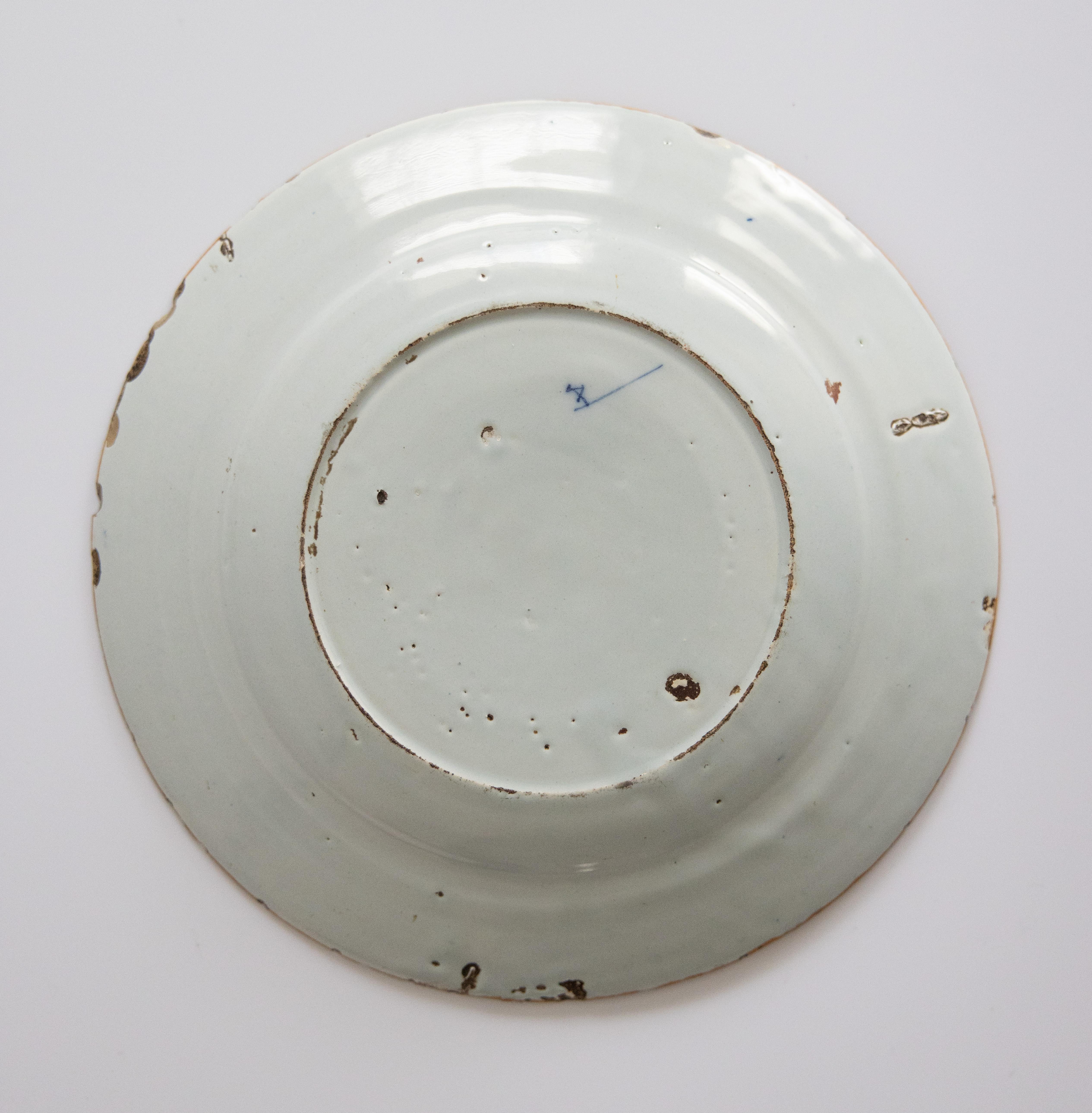 18th Century and Earlier Pair of 18th Century Dutch Delft Faience Floral Plates For Sale