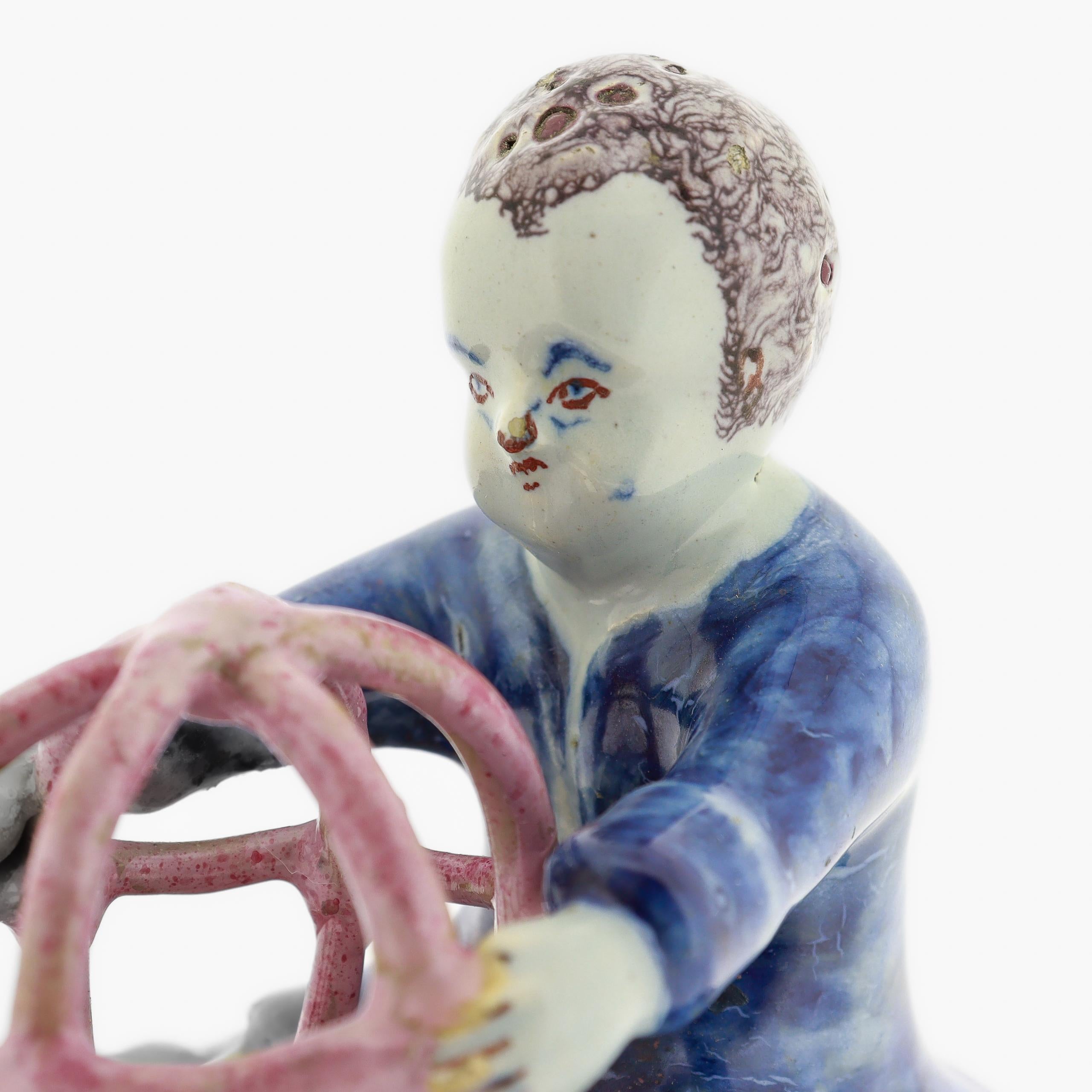 Antique 18th Century Dutch Delft Figurine of a Boy holding a Birdcage with Bird For Sale 7