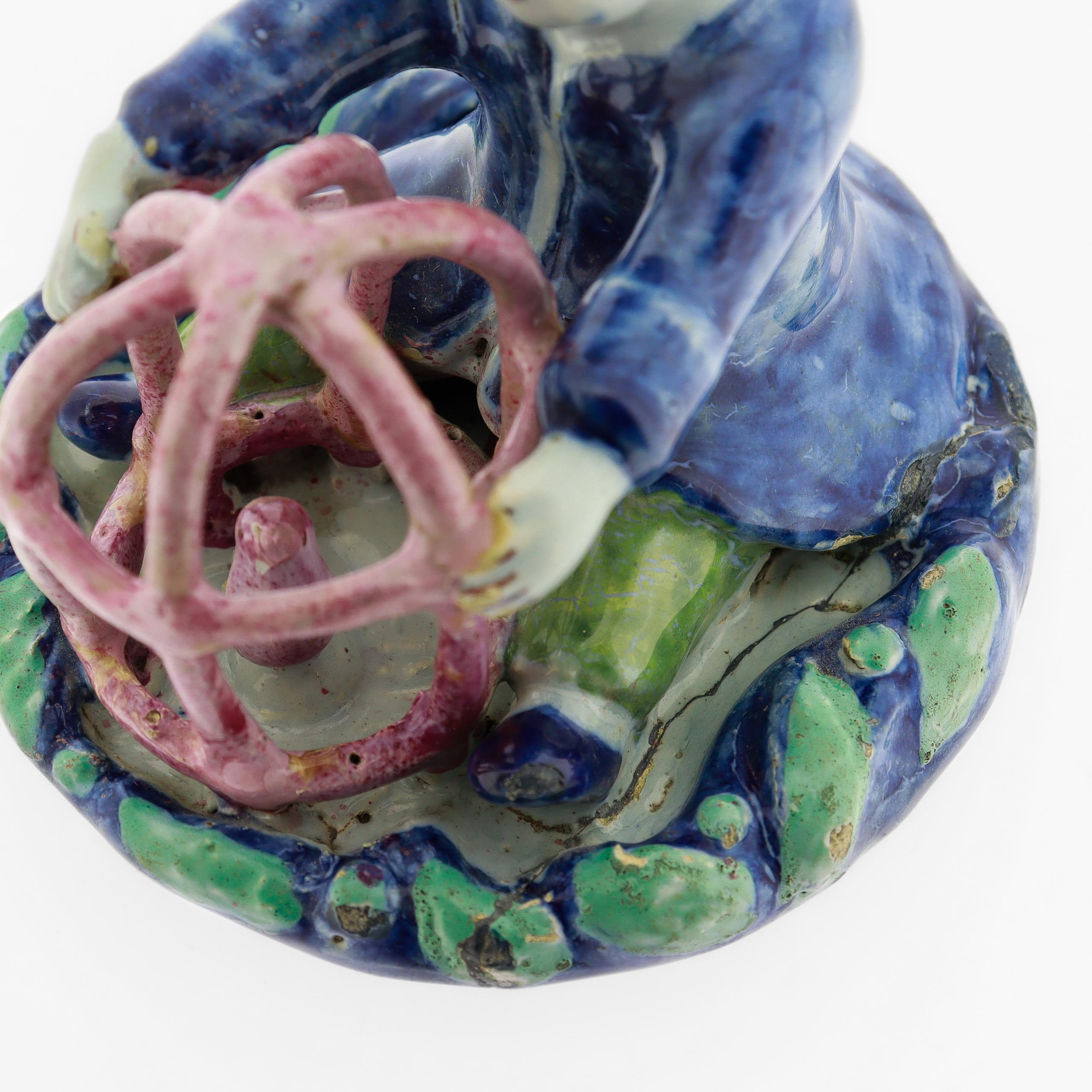 Antique 18th Century Dutch Delft Figurine of a Boy holding a Birdcage with Bird For Sale 10