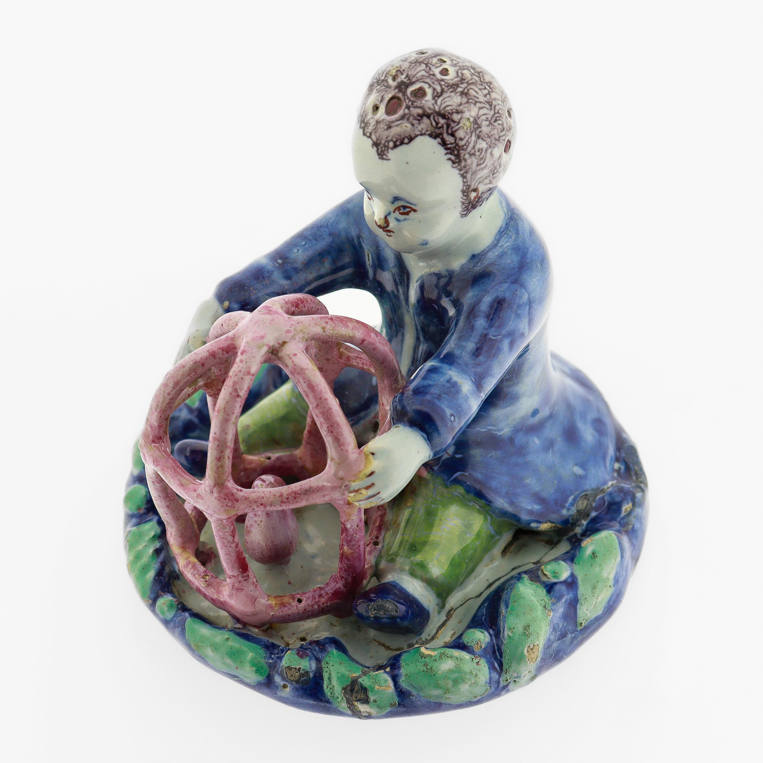 Antique 18th Century Dutch Delft Figurine of a Boy holding a Birdcage with Bird For Sale 3