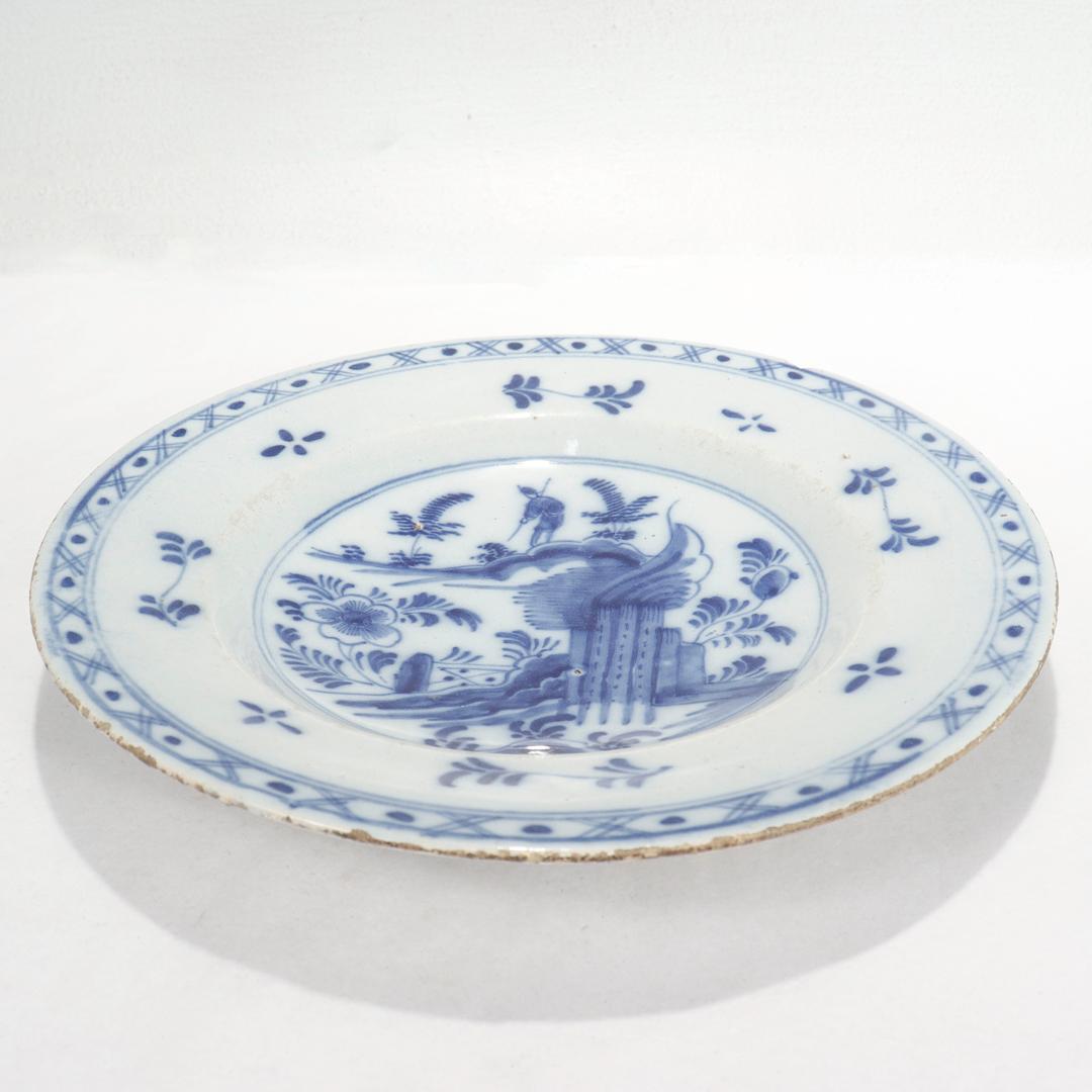Antique 18th Century Dutch Delft Plate with Chinoiserie Decoration In Fair Condition For Sale In Philadelphia, PA