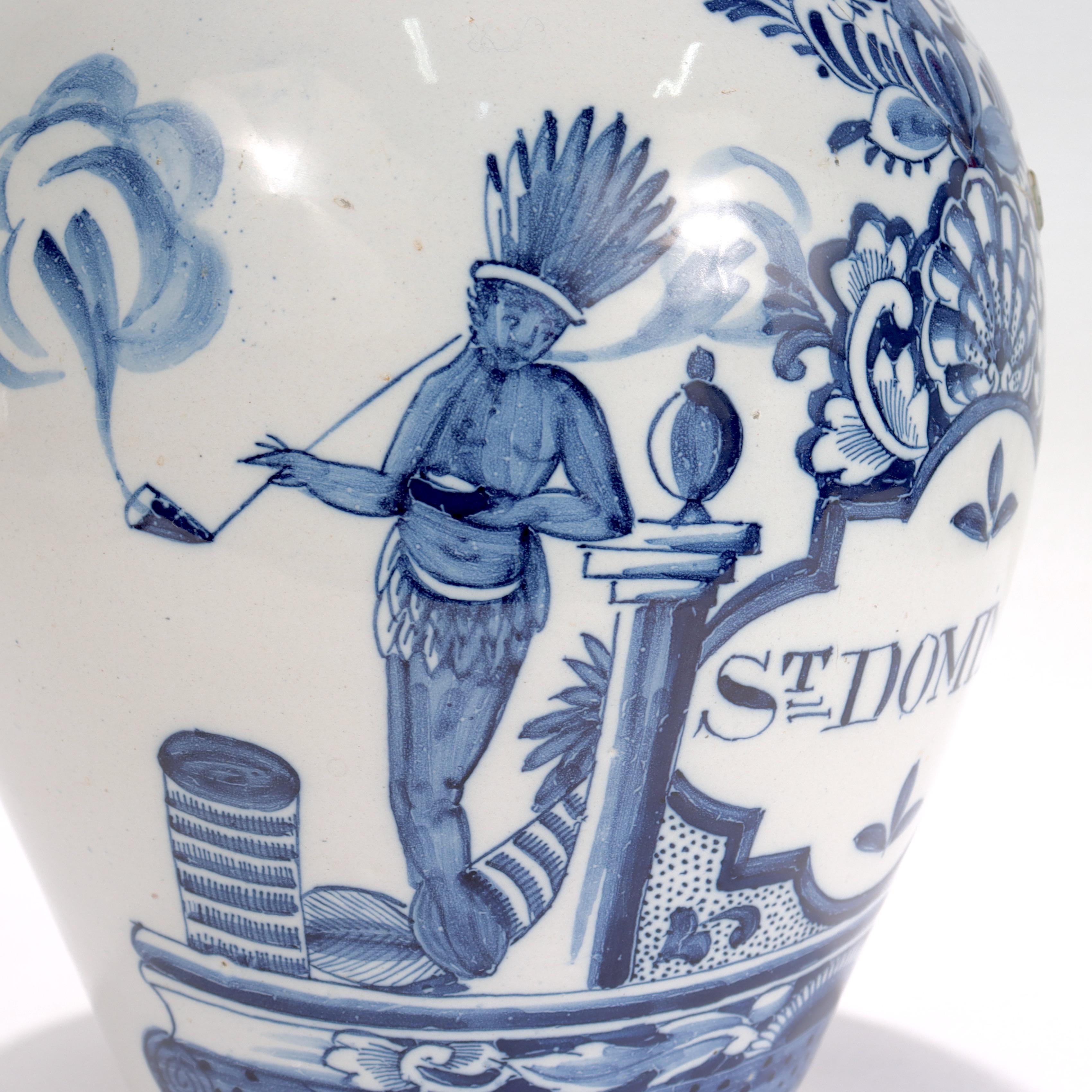 A fine antique Delft tobacco jar.

From the Dutch De Drie Klokken (The Three Bells) Pottery Factory.

Together with a period brass cover.

Originally designed as a vessel for 'Santo Domingo' tobacco (in the form of long plugs or twists of