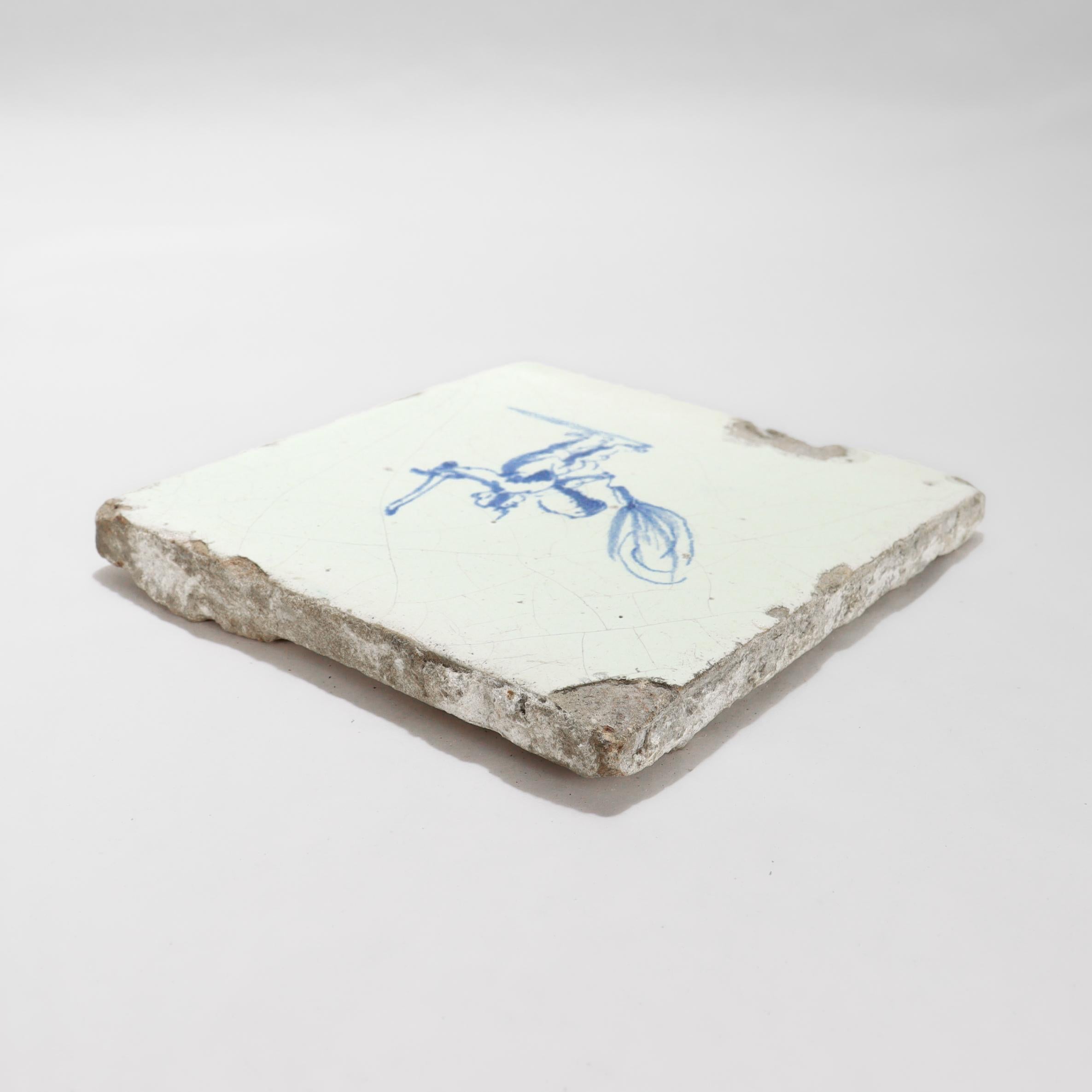 Faïence de Delft carreau de Delft ancien du 18ème siècle représentant un Cupidon ou un ange en vente