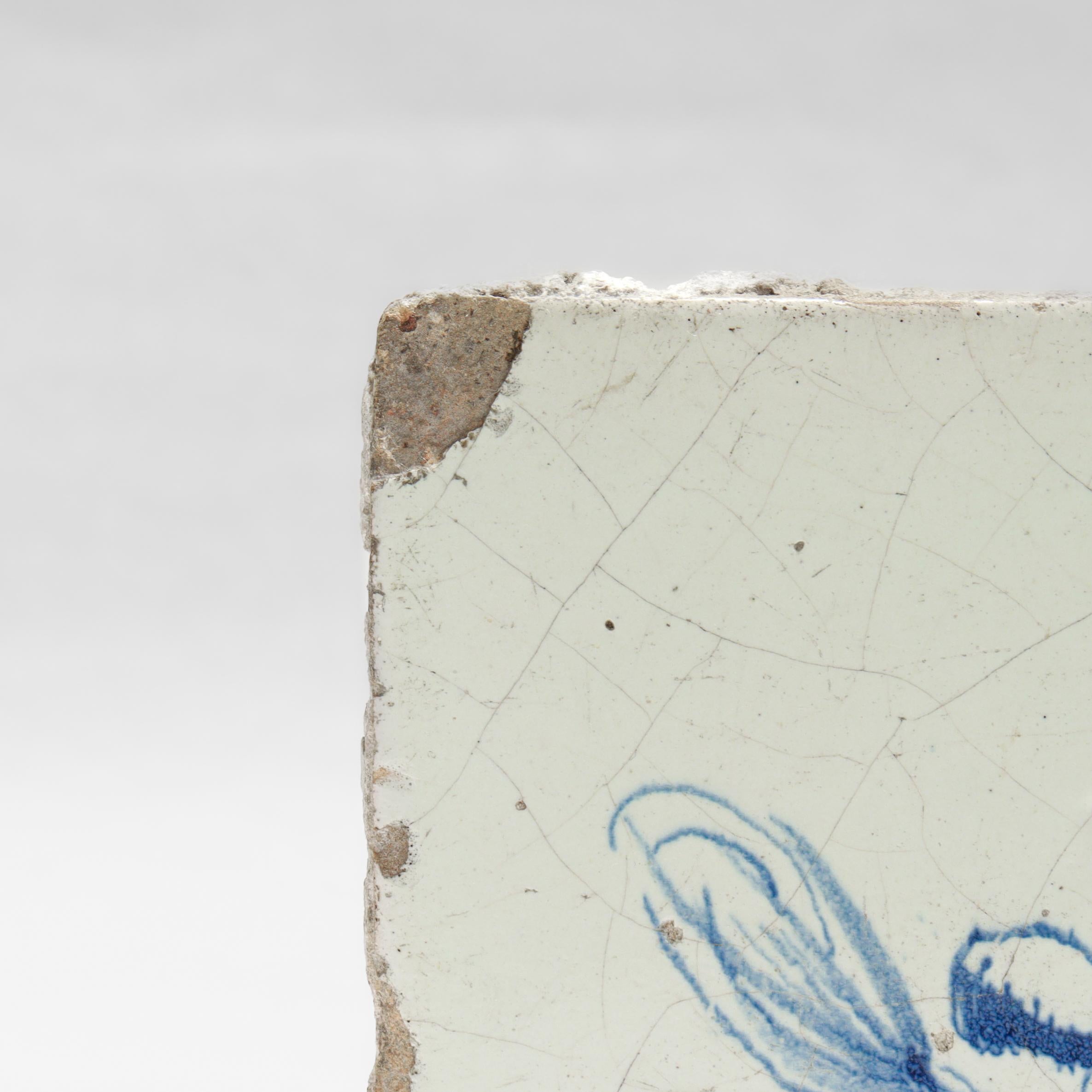 carreau de Delft ancien du 18ème siècle représentant un Cupidon ou un ange en vente 2