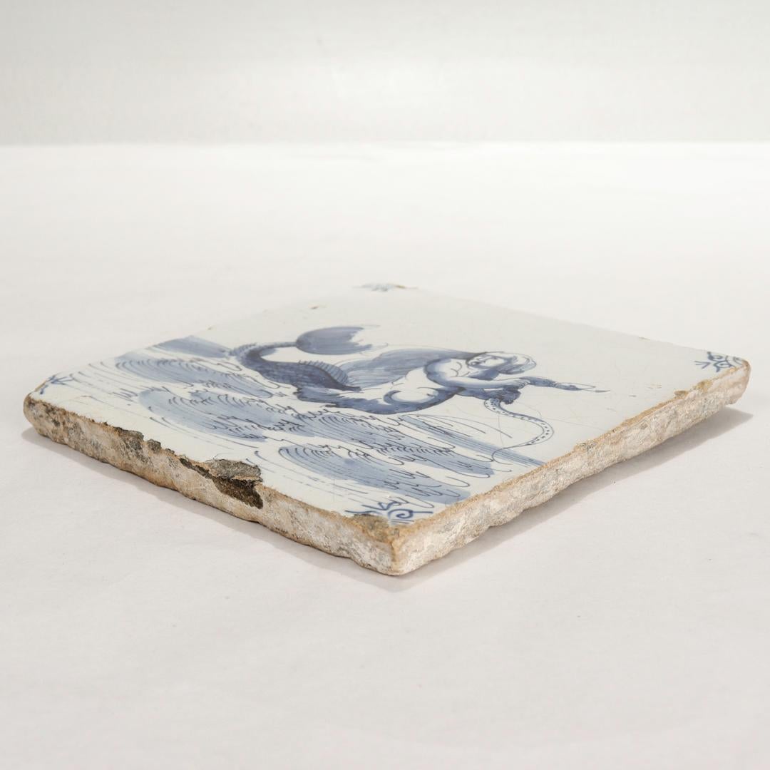 18th Century and Earlier Antique 18th Century Dutch Delft Tile of a Mermaid & Serpent For Sale