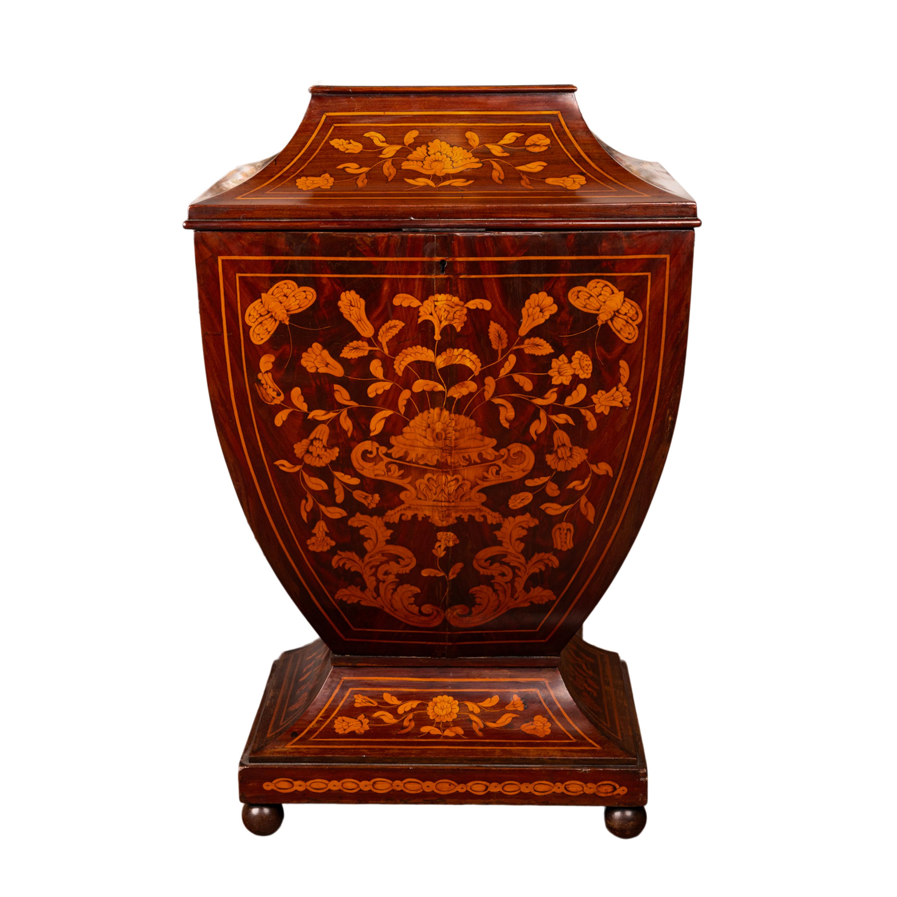 An exceptionally rare & fine antique Dutch marquetry bombe shaped rosewood wine cellarette/cooler, circa 1760.
The hinged top of ogee/sarcophagus form and finely inlaid with floral panels, enclosing a storage area for wine bottles. The base is of