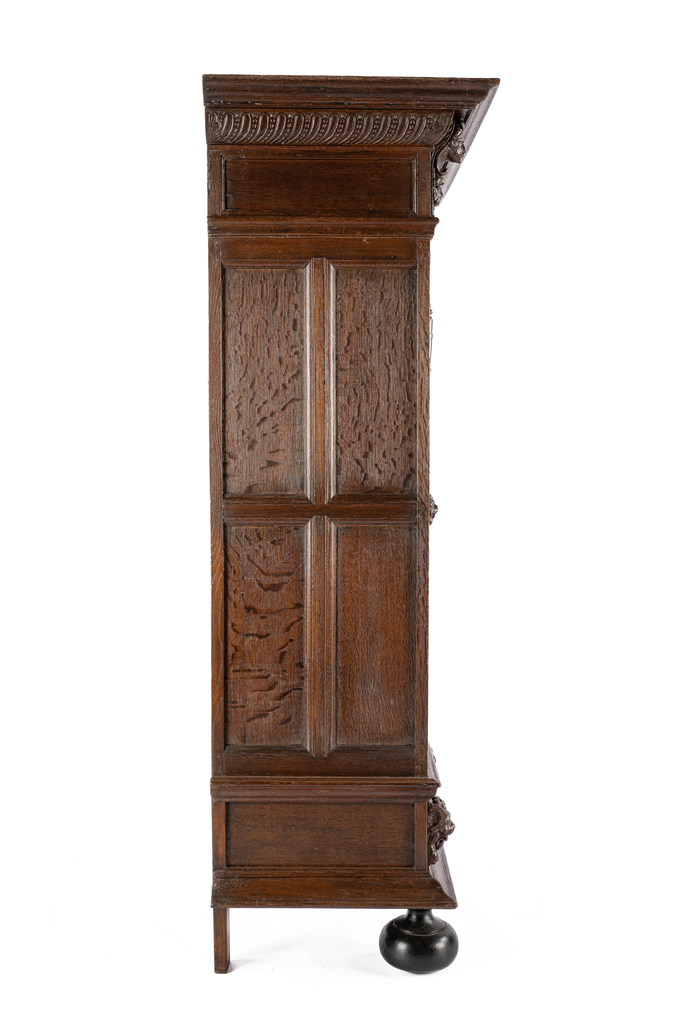 Carved Antique 18th century Dutch Renaissancewarm brown oak two door cabinet For Sale