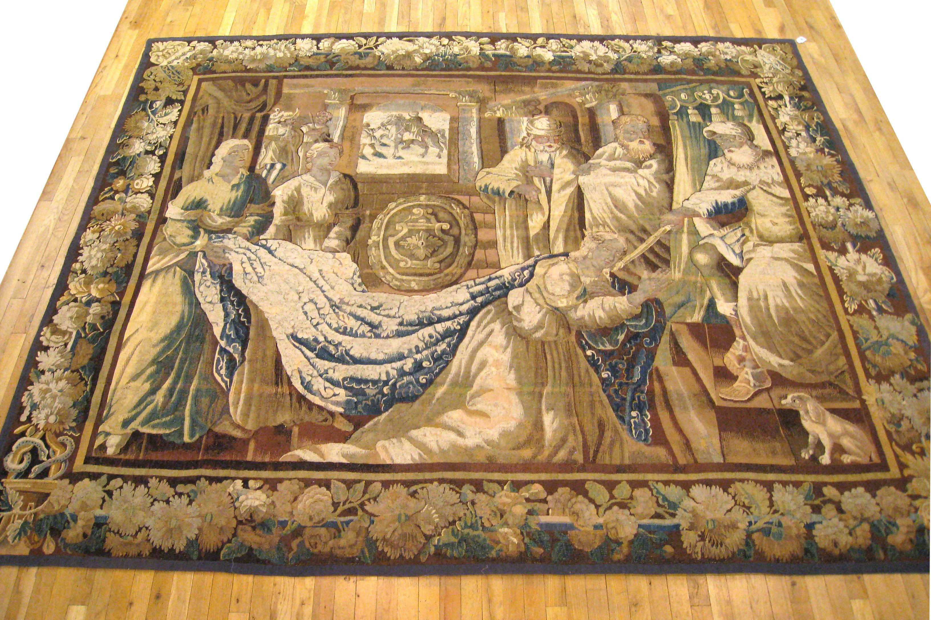 An antique 18th century Flemish Biblical tapestry, size 8'3 H x 10'1 W. 

This period European tapestry depicts a climactic moment from the Biblical account of the Purim story, with Queen Esther daring to approach the ruler of the vast Persian
