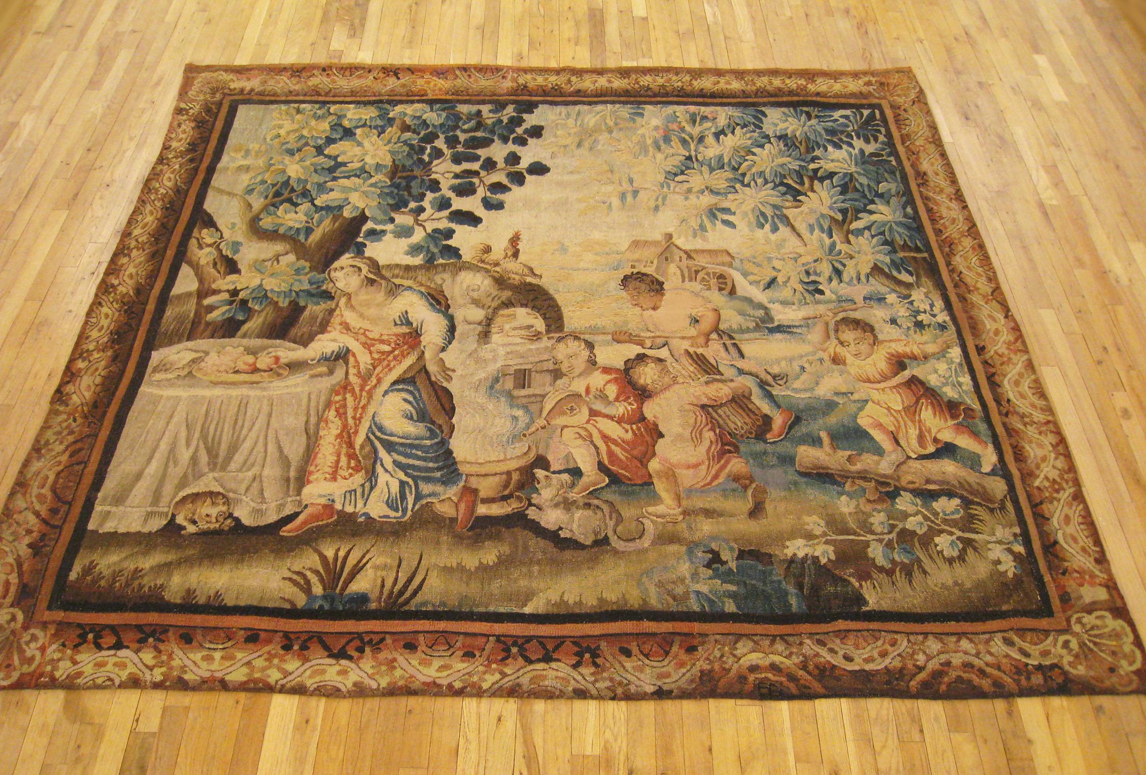 Antique 18th Century French Aubusson Rustic Tapestry of a Family Preparing Lunch

An antique French Aubusson rustic tapestry from the 18th century, size 7'8