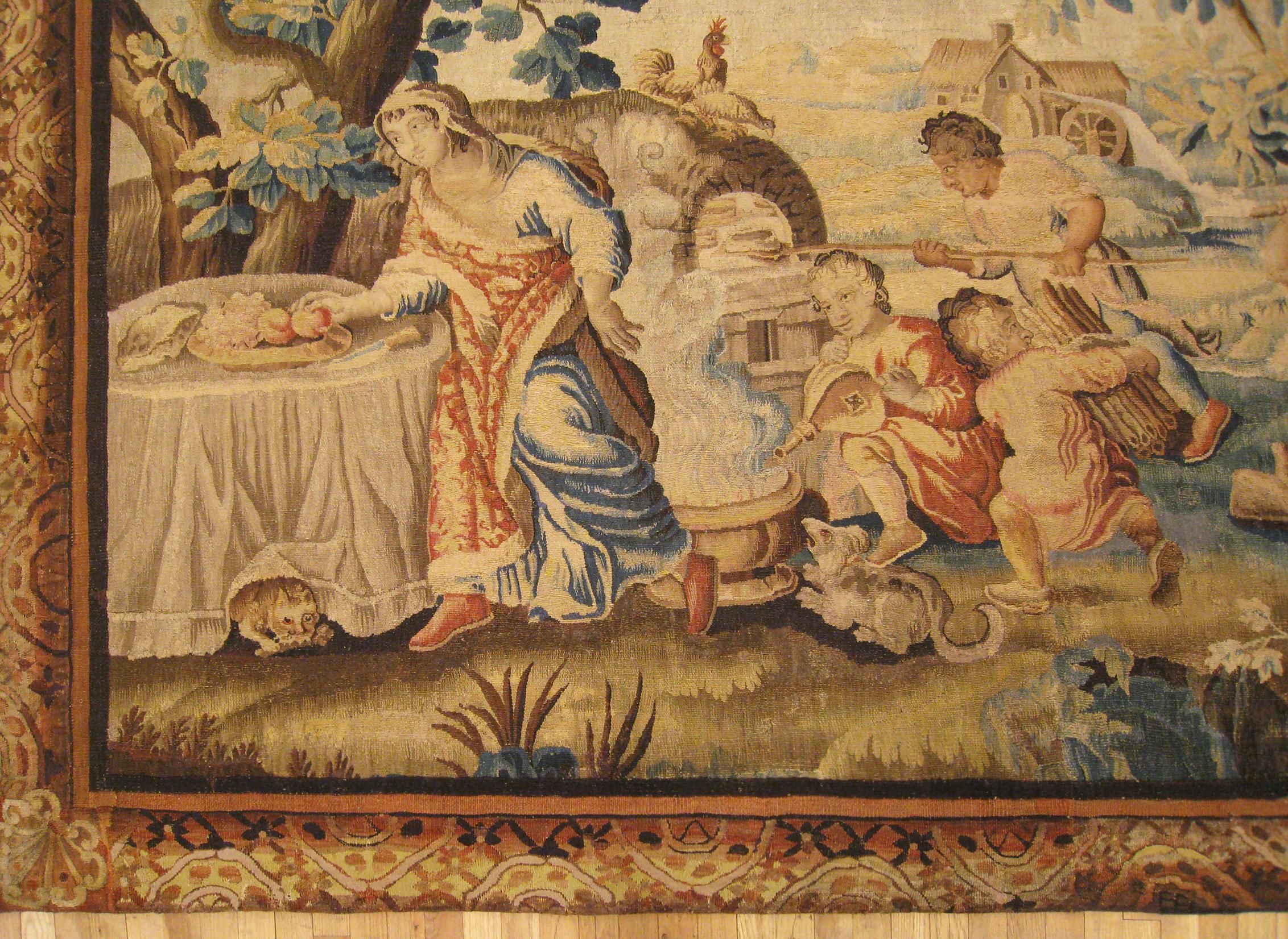 Tessuto a mano Antico arazzo rustico Aubusson francese del XVIII secolo raffigurante una famiglia che prepara il pranzo in vendita