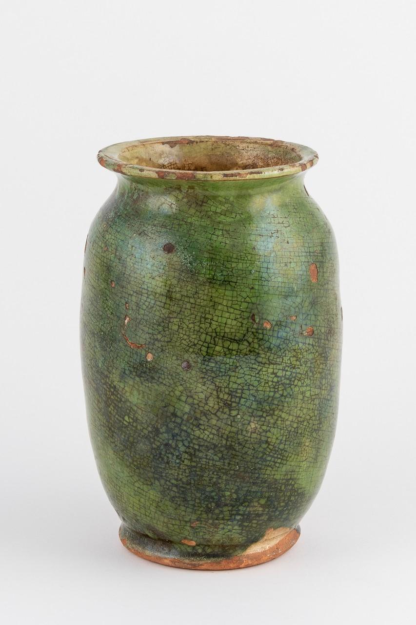 large old vessel a muted green