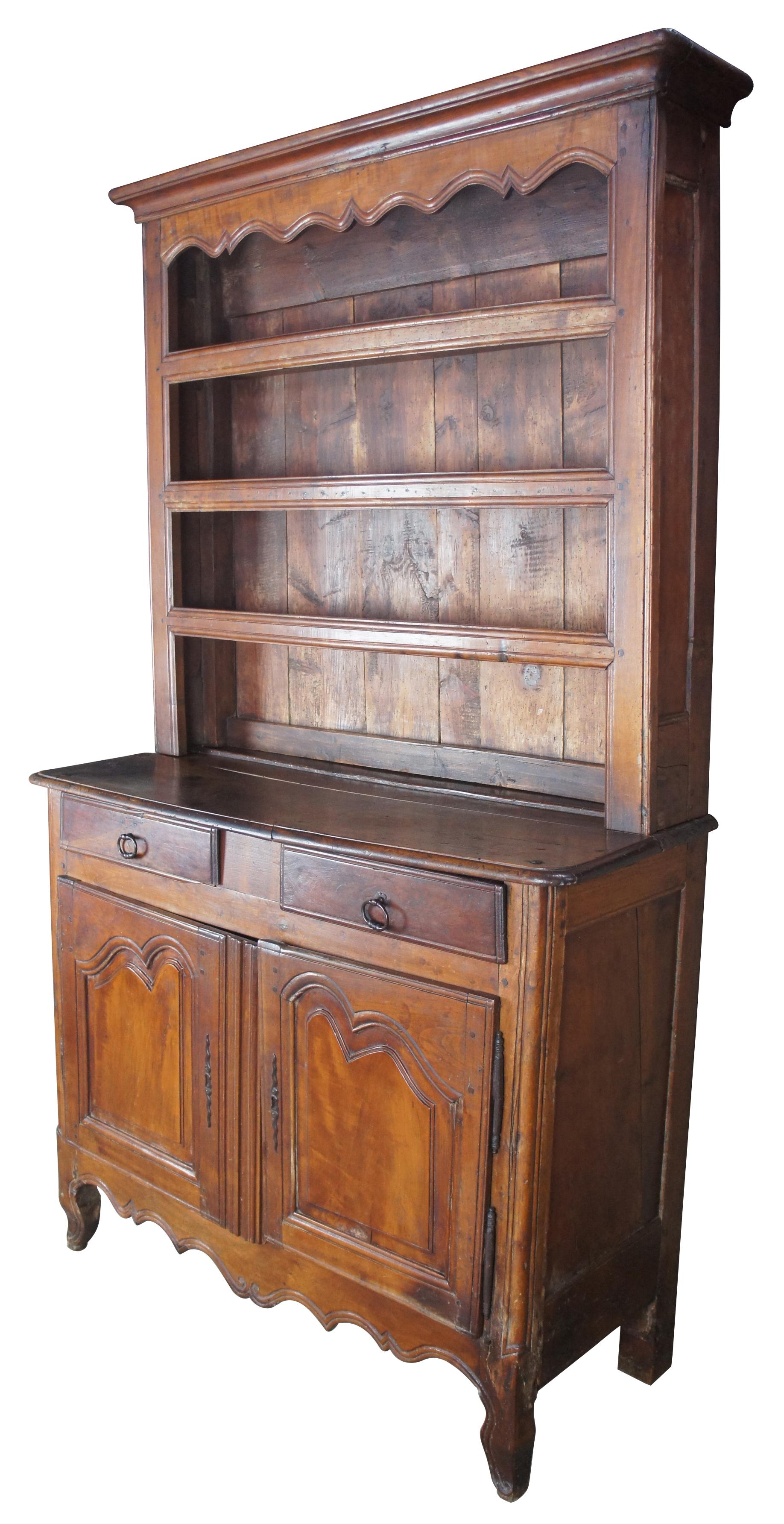 Antique 18th century French country rustic oak cupboard China hutch sideboard

Old world 18th century French cupboard; features four shelves with plate grooves, two hand dovetailed drawers and lower cabinet for storage. 

Sideboard surface