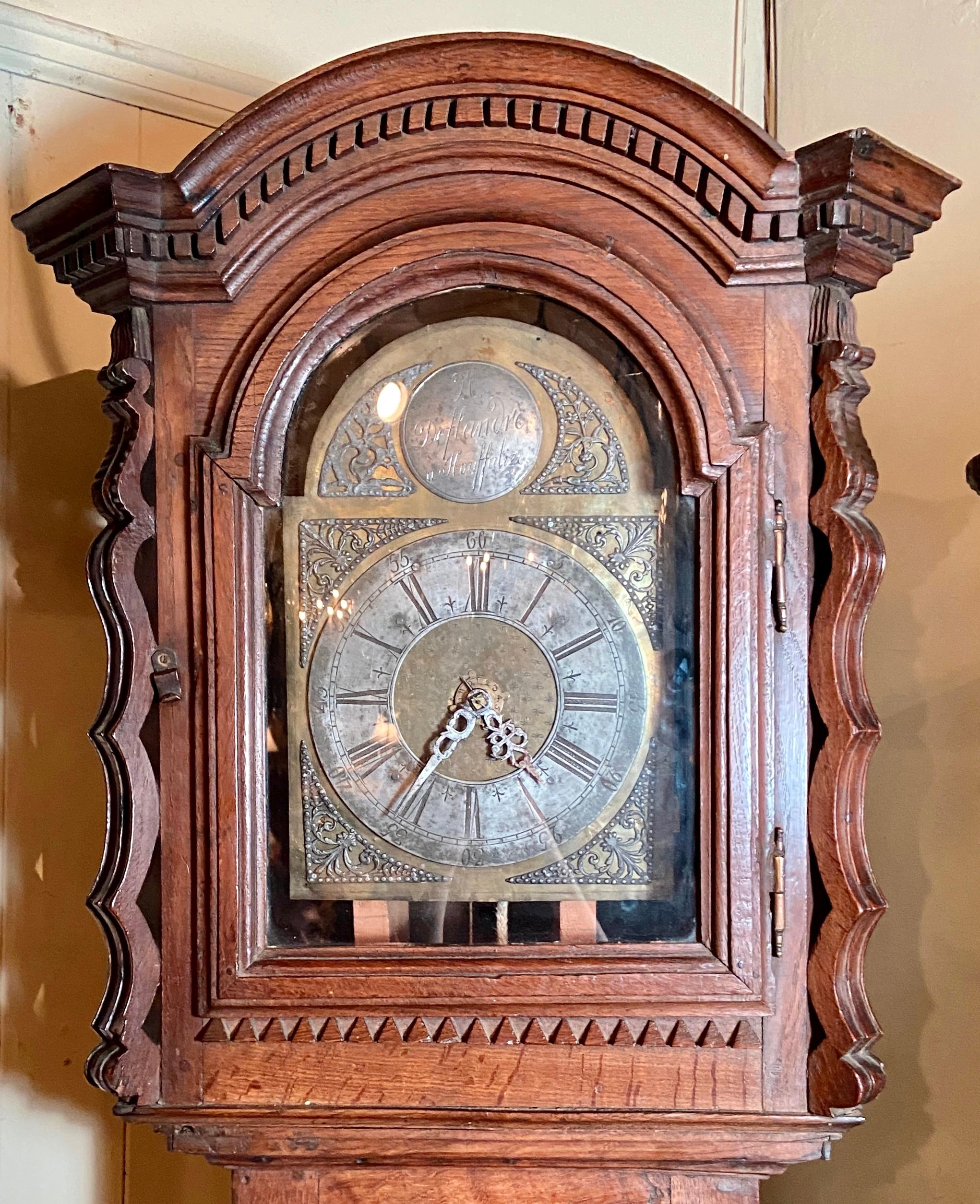 Antique 18th century French decorative long case clock with newly refurbished mechanisms.
Please note that this is an old clock face with refurbished and modernized clock mechanisms.  There are no weights and no pendulum.  Please contact us for