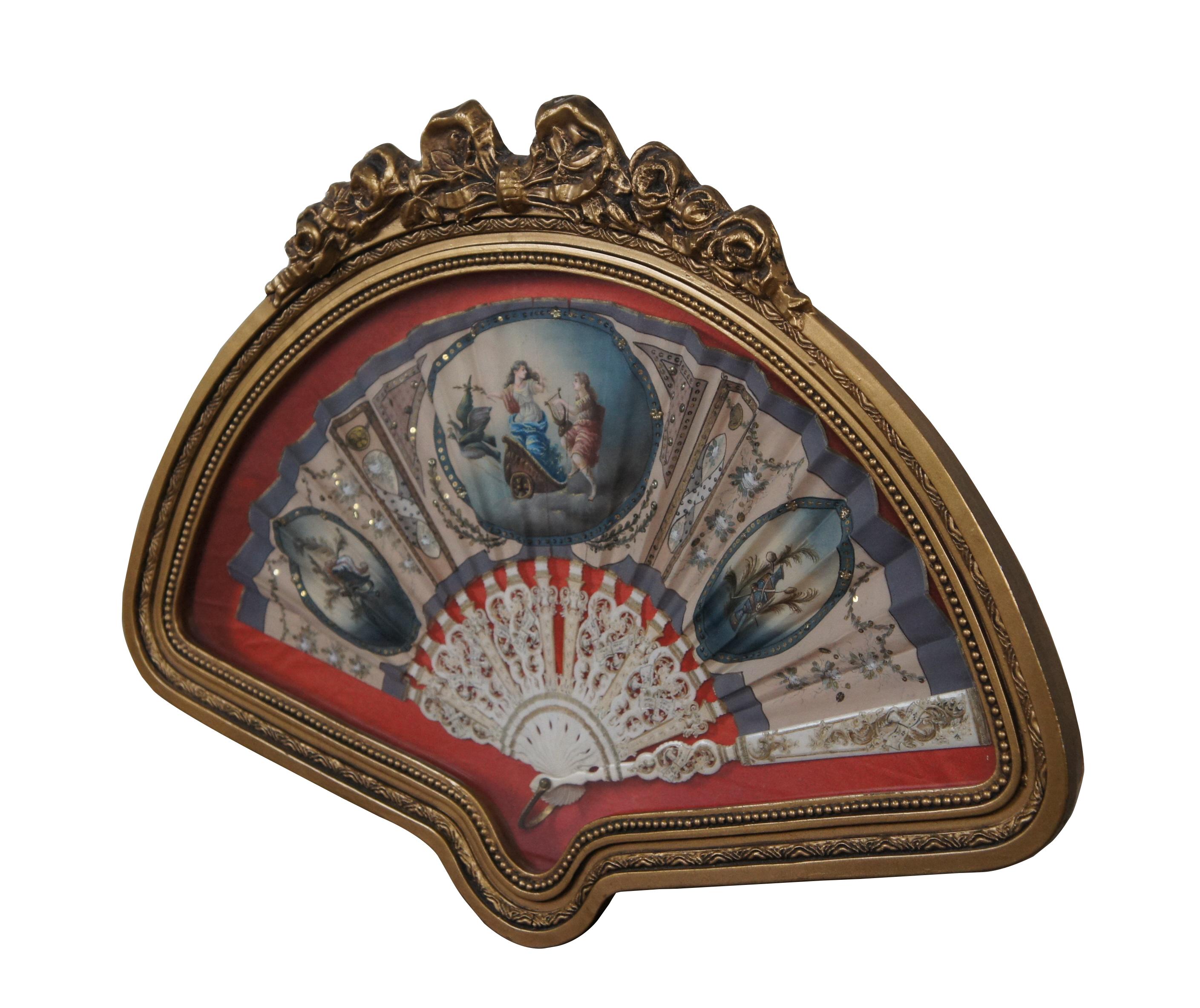 Antique 18th century French Louis XVI / Neoclassical painted boudoir hand fan. White sticks pierced with foliate / floral designs as well as trumpets and sheets of music; gilded accents. Silk fan surface hand painted with a beige and purple back