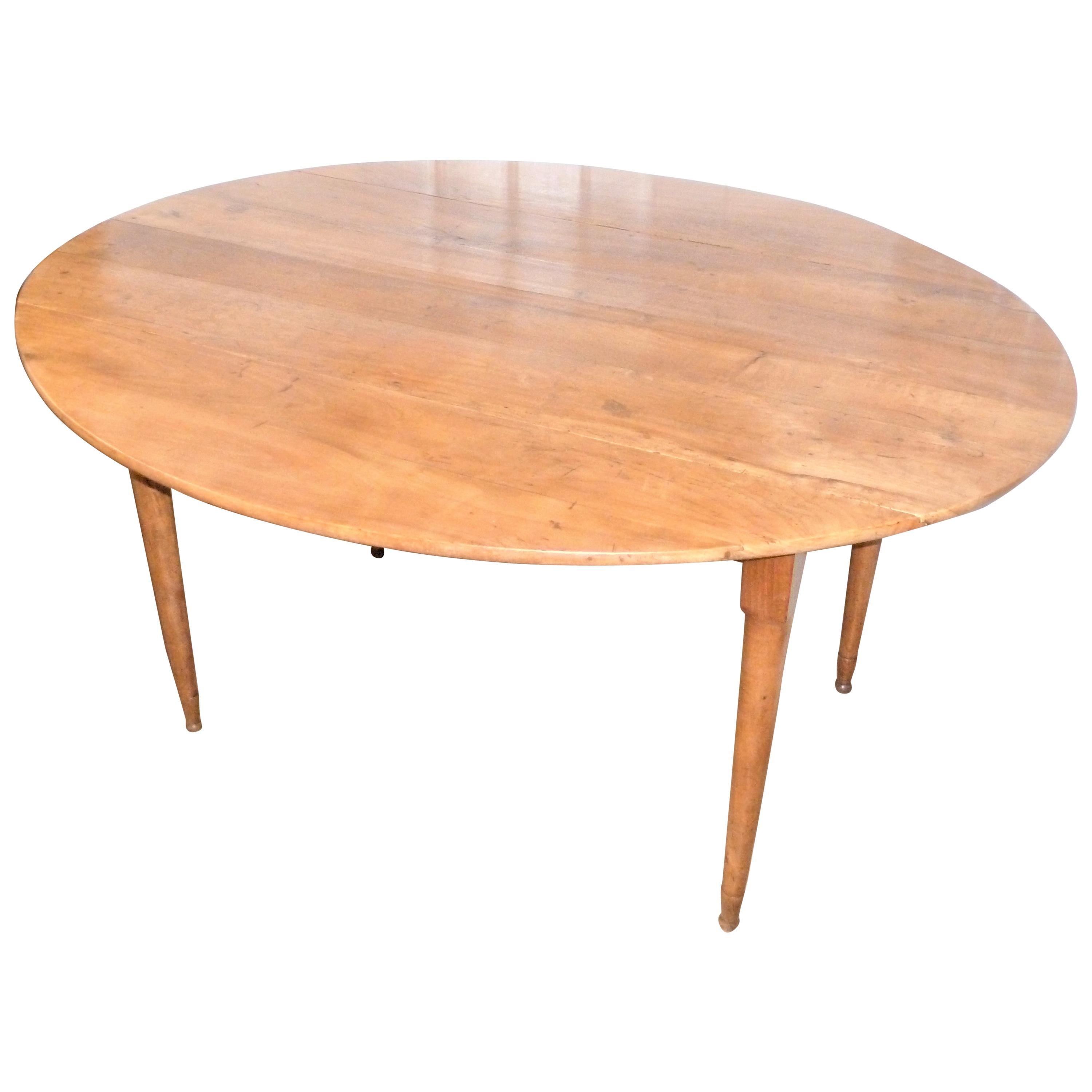Antique 18th Century French Oval Drop-Leaf Cherry Dining Table on Louis XVI Legs For Sale