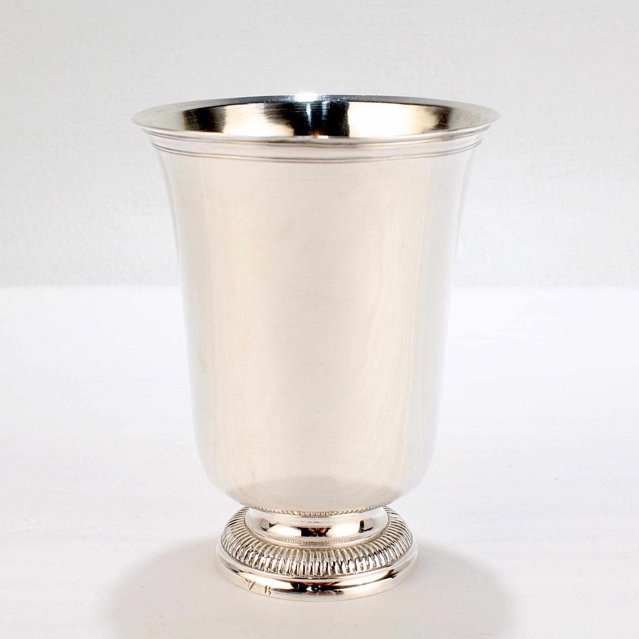 A fine antique French silver beaker.

Illegibly hallmarked to the base and side and inscribed with an owner's mark 'VB' to the foot.

Simply a wonderful example of 18th Century French silver!

Date:
ca. 1800

Overall Condition:
It is in overall