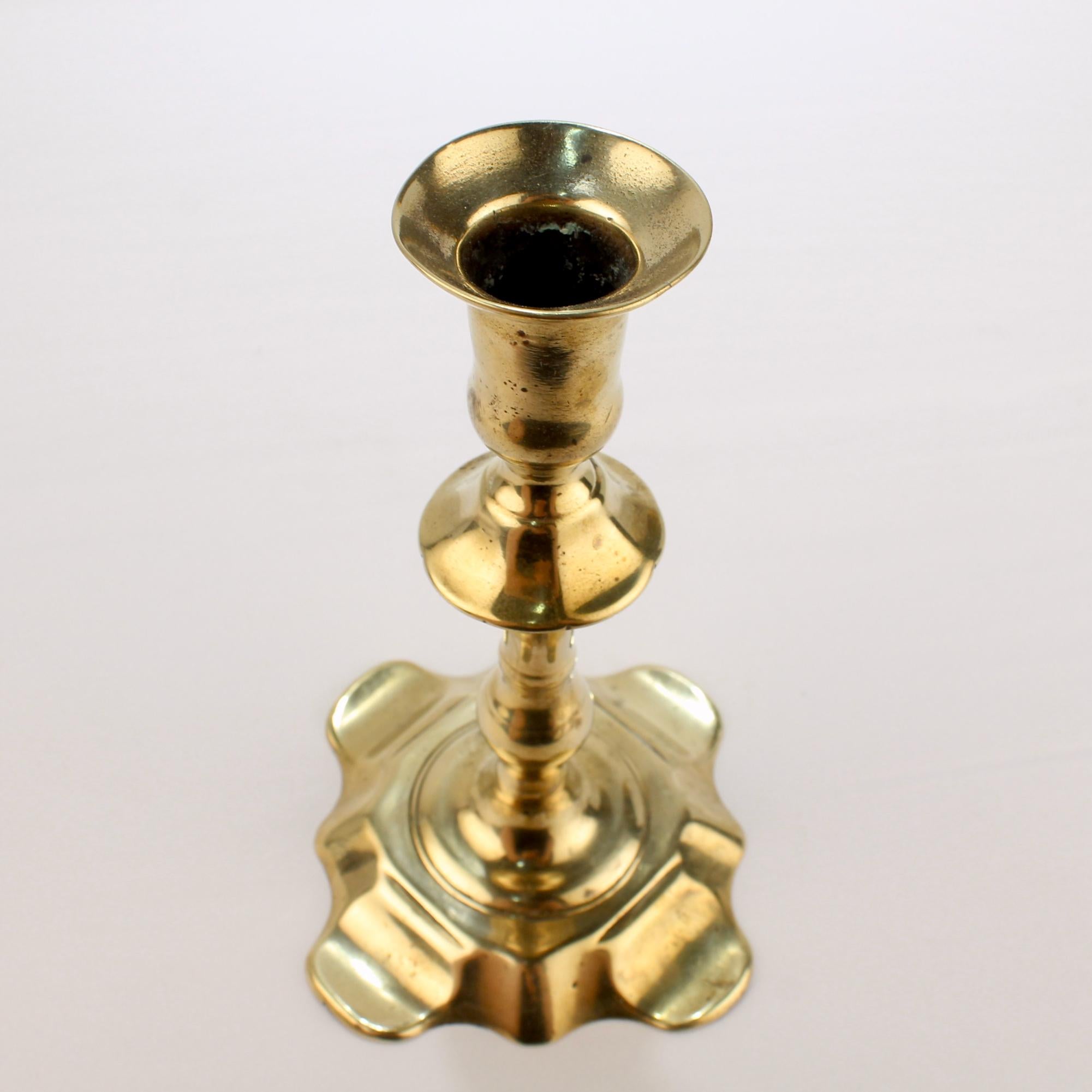 Antique 18th Century George II English Brass Petal Base Single Candlestick For Sale 1