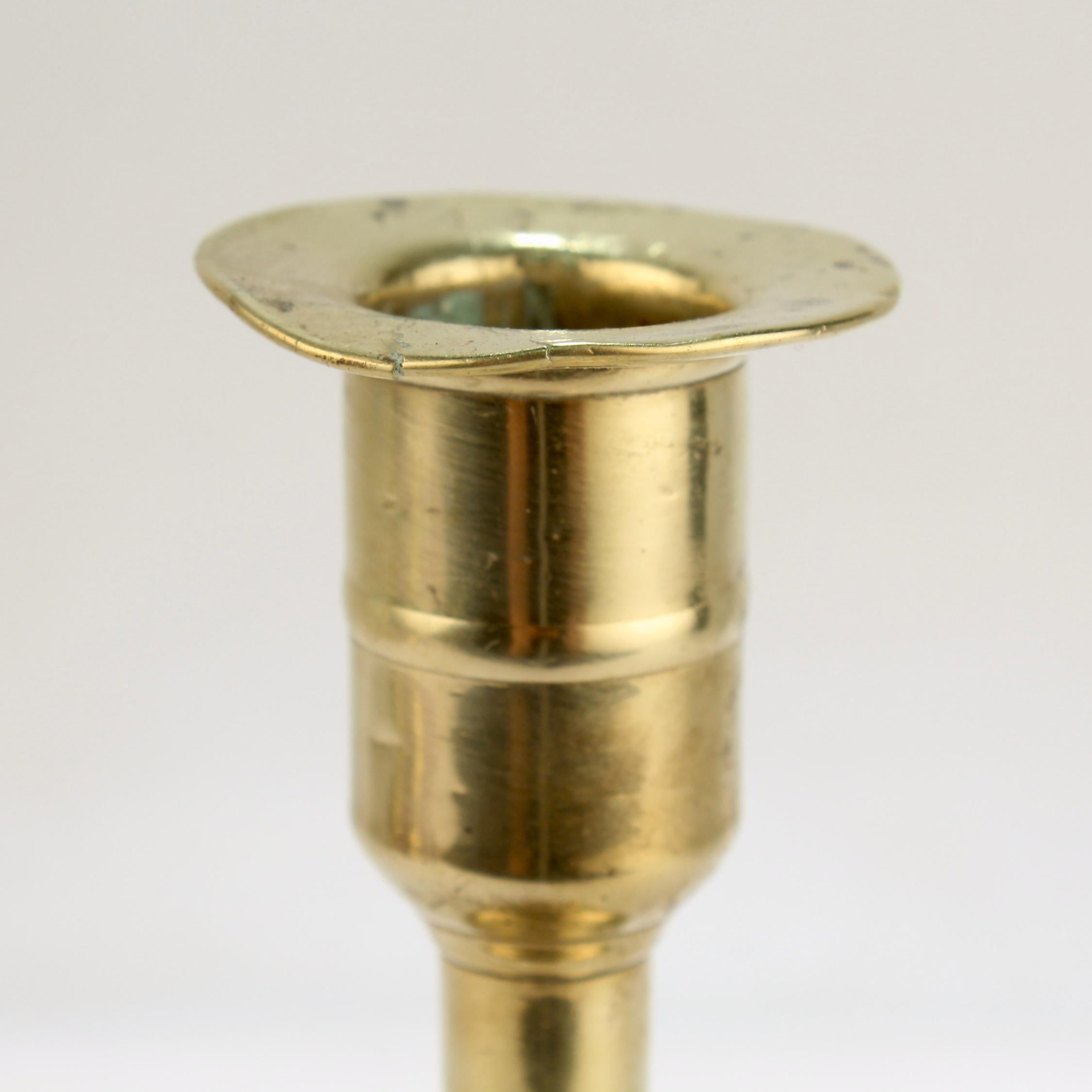 Antique 18th Century George II English Brass Petal Base Single Candlestick In Fair Condition For Sale In Philadelphia, PA