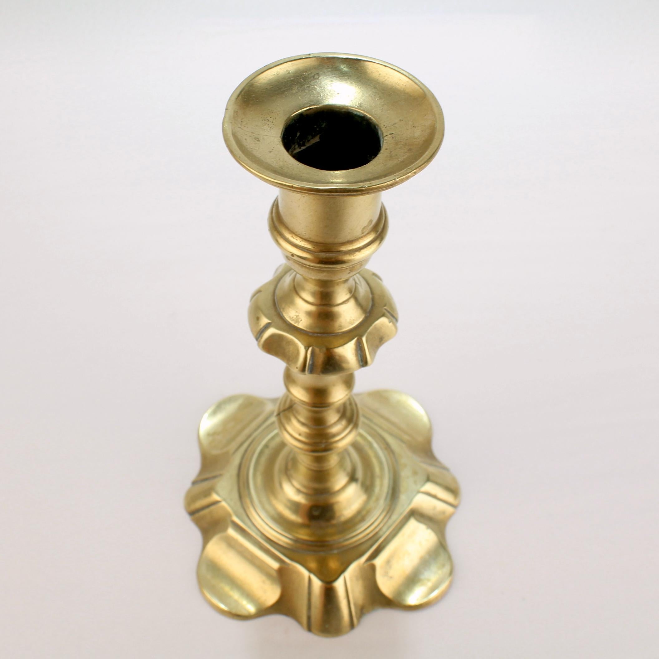 Antique 18th Century George II English Brass Petal Base Single Candlestick  For Sale 1