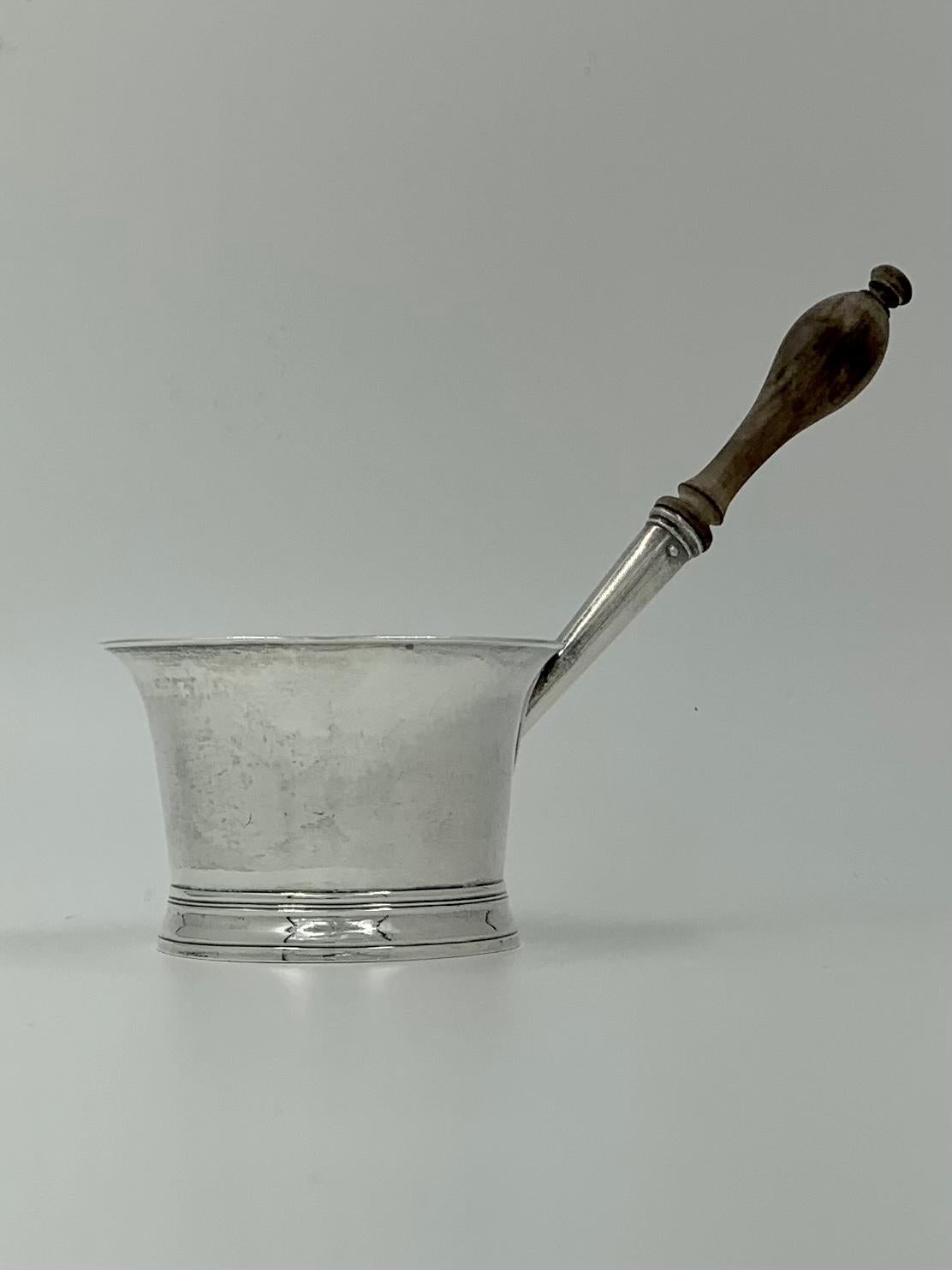 Splendid antique English sterling silver brandy/spirits warmer, George II period, 1743
Attributed to Edward Wakelin- the initials in the Gothic style correspond to Wakelin's, perhaps a variation of his best known mark with the fleur de lis
