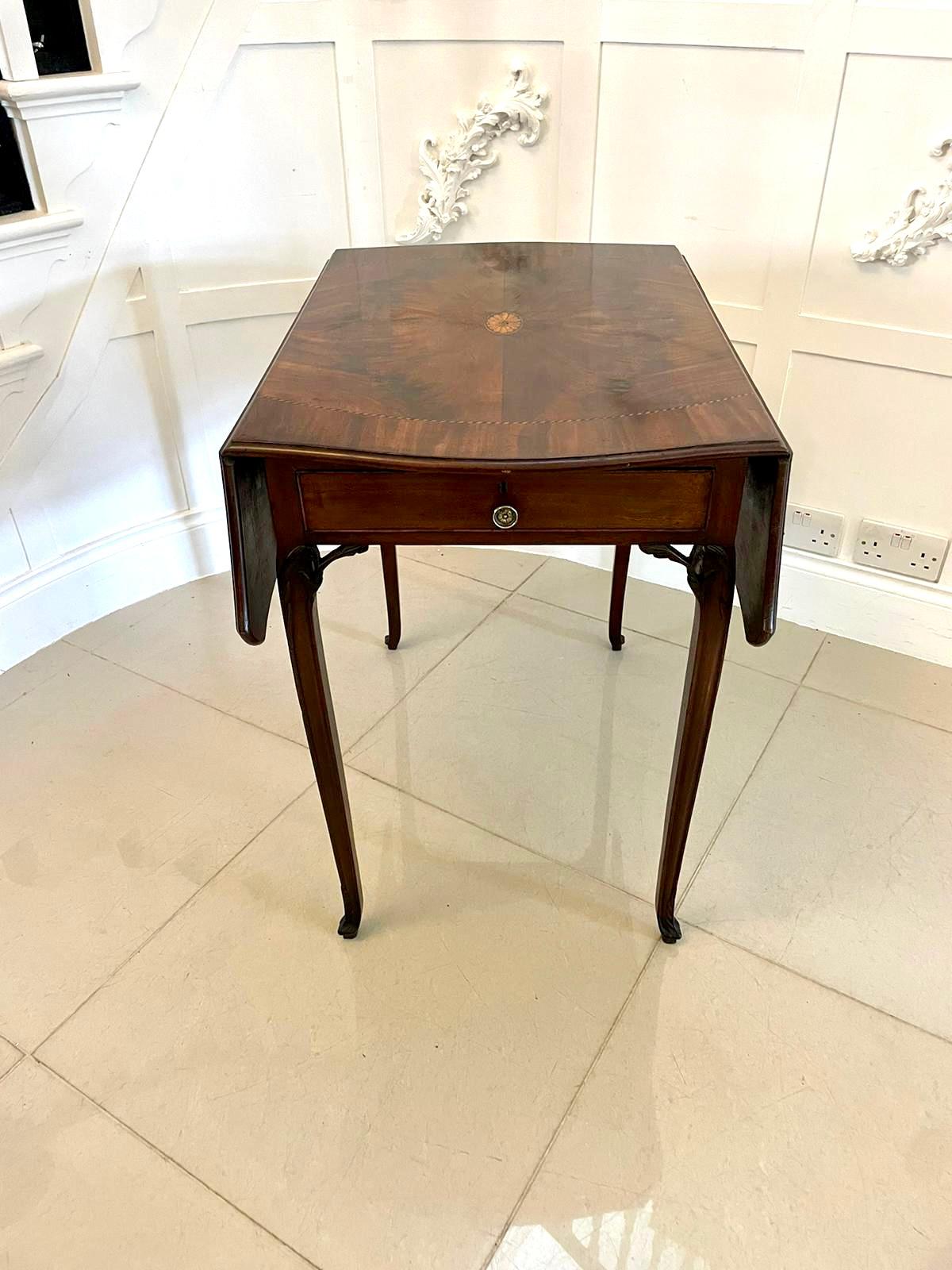 Antique 18th century George III quality mahogany inlaid butterfly Pembroke table having a quality mahogany inlaid butterfly shaped top with a moulded edge, one drawer to the frieze and standing on elegant shaped cabriole legs with scroll feet 

A