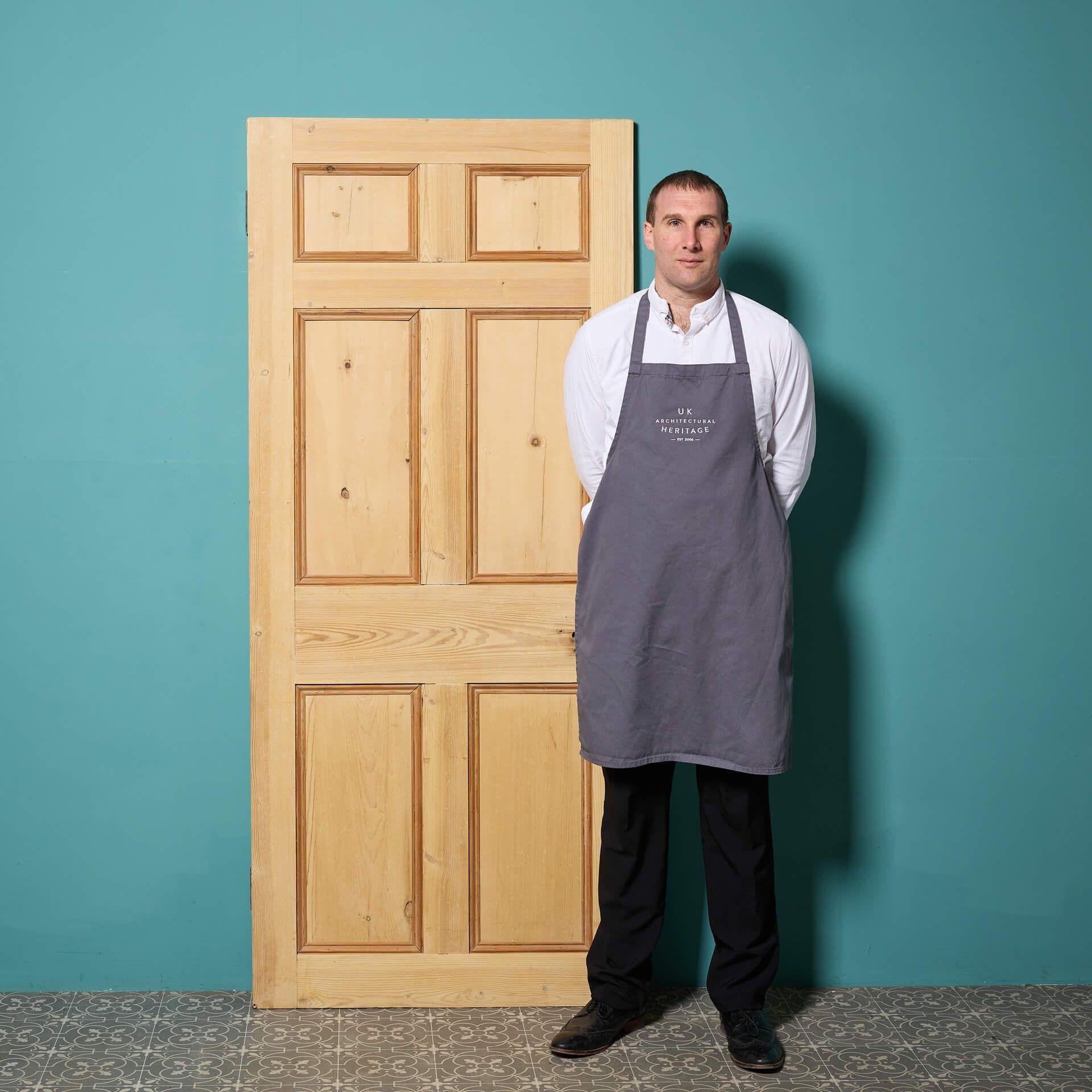 An antique Georgian stripped pine internal door, reclaimed from a Georgian townhouse in Padstow.

Dating to the late 18th century, this antique door is made from solid pine and has a wonderful stripped finish, ready for application of paint, stain