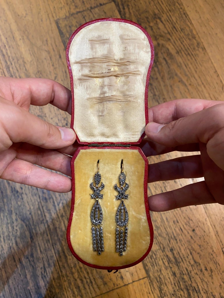 Pair of Georgian Diamond Pendant Earrings in Silver and Gold, Portugal, Late 18th/Early 19th Century, fitted in Period Case. Each of the antique earrings from the late 1700s/early 1800s is designed with openwork foliate and drop motifs and