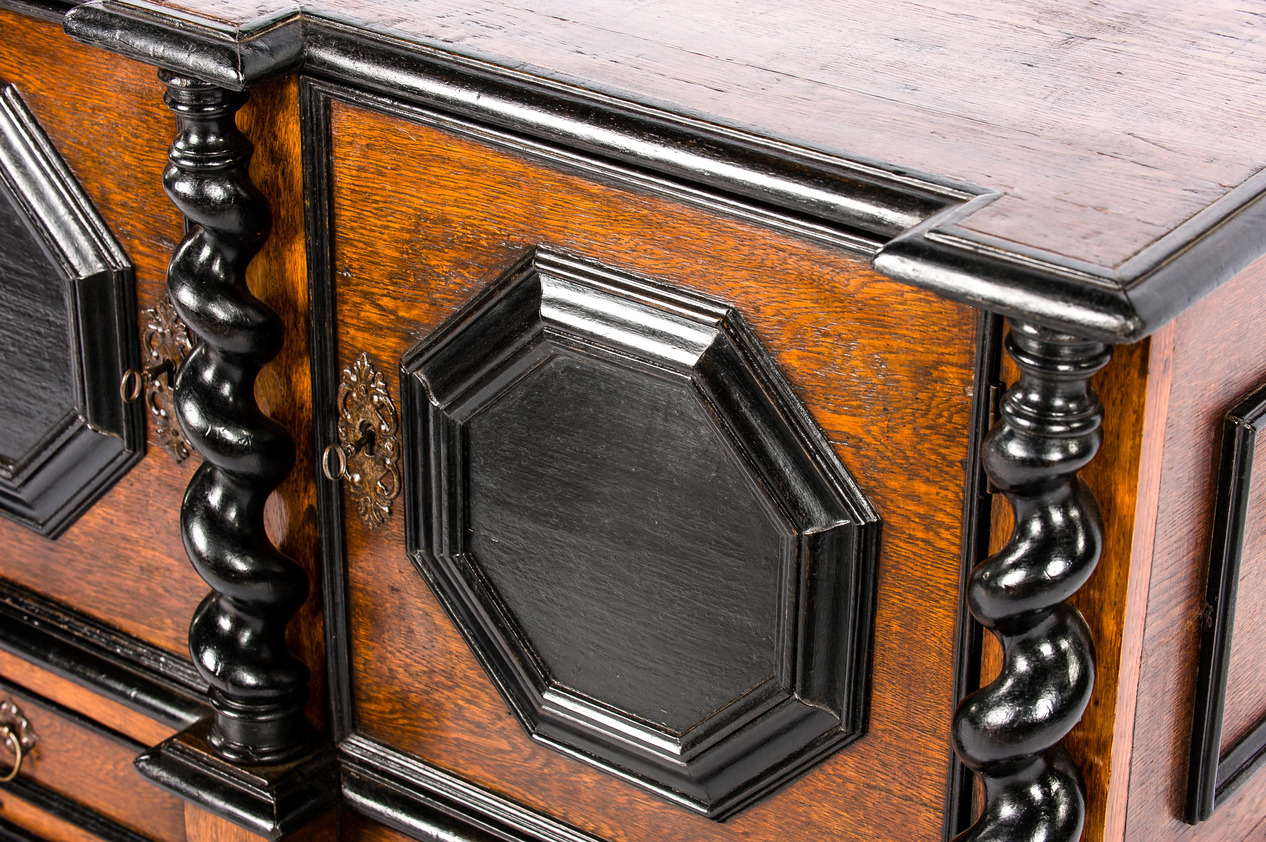 Antique 18th Century German Baroque Oak Cabinet with Black Panels For Sale 11