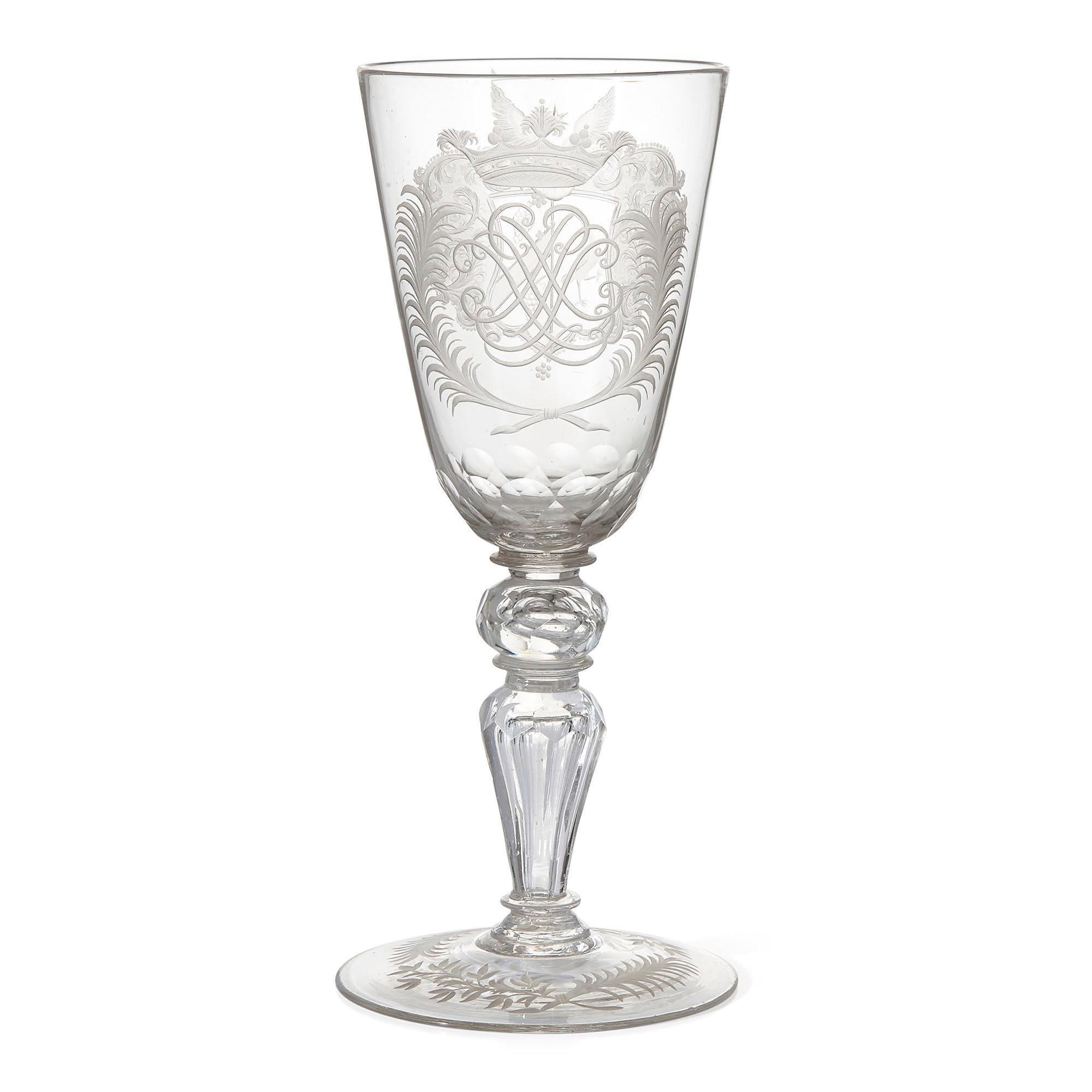 Antique 18th century glass goblet with engraving from Thuringia
German, c. 1740
Dimensions: Height 29cm, diameter 12.5cm

Produced in Germany in c. 1740, this antique glass goblet is a fine example of 18th century Thuringian glassmaking. The