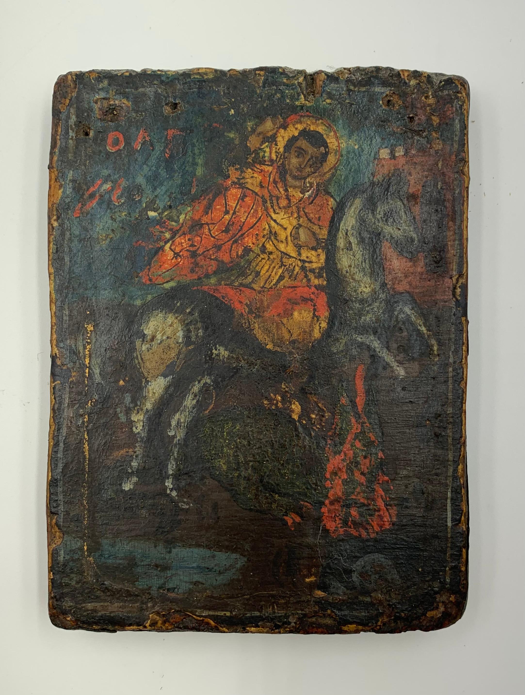 18th century Greek Orthodox travel icon depicting Saint George and the Dragon
The Saint George legend is a classic story of the conflict between Light and Darkness. Here, the Saint is depicted on his white horse striking the dragon with his spear, a