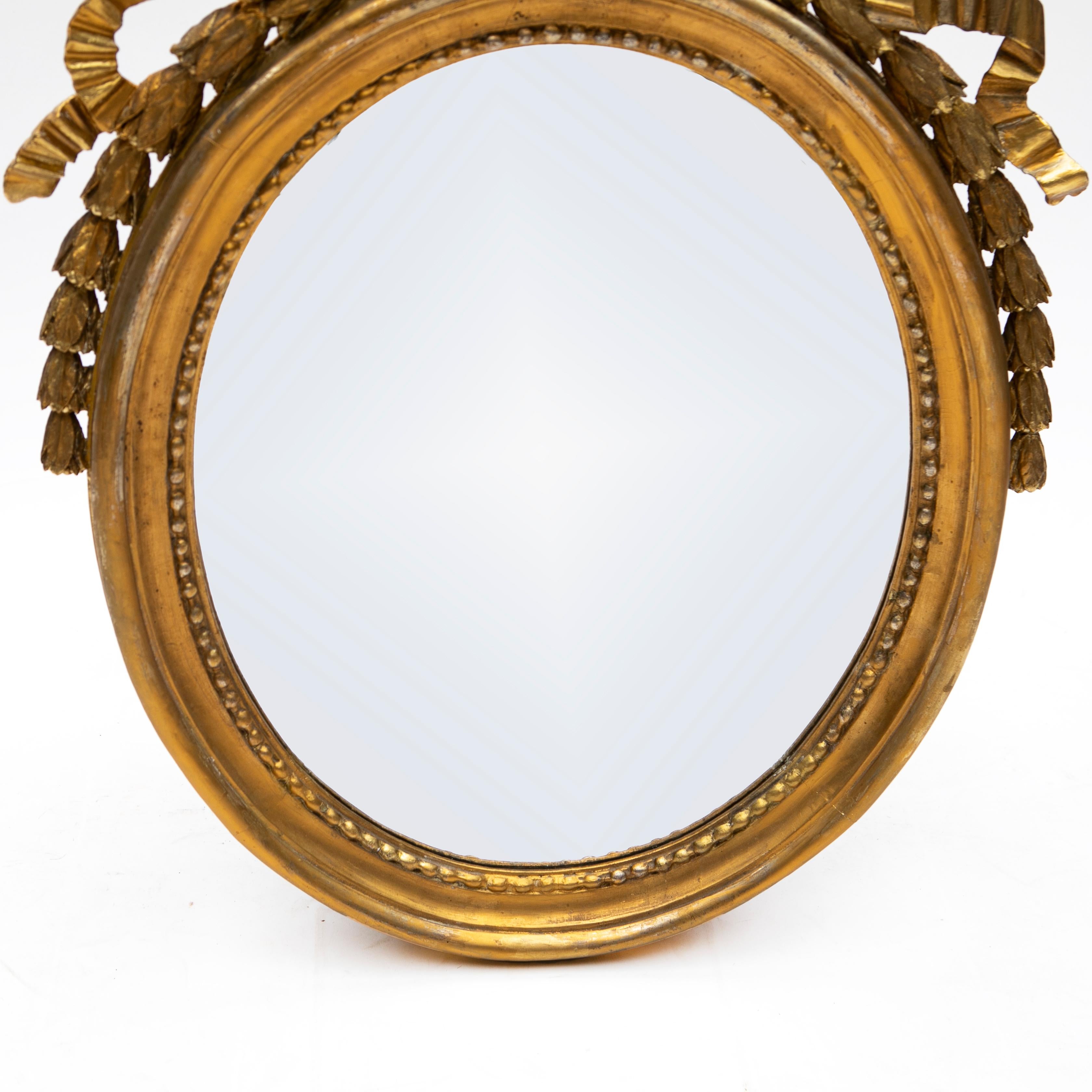 Swedish Oval Gustavian Giltwood Wall Mirror For Sale