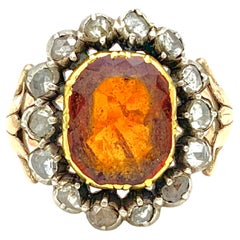 Antico anello d'oro in argento con diamante e granato d'assonite del XVIII secolo