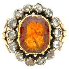 Bague ancienne du 18ème siècle, grenat hessonite, diamant, or et argent