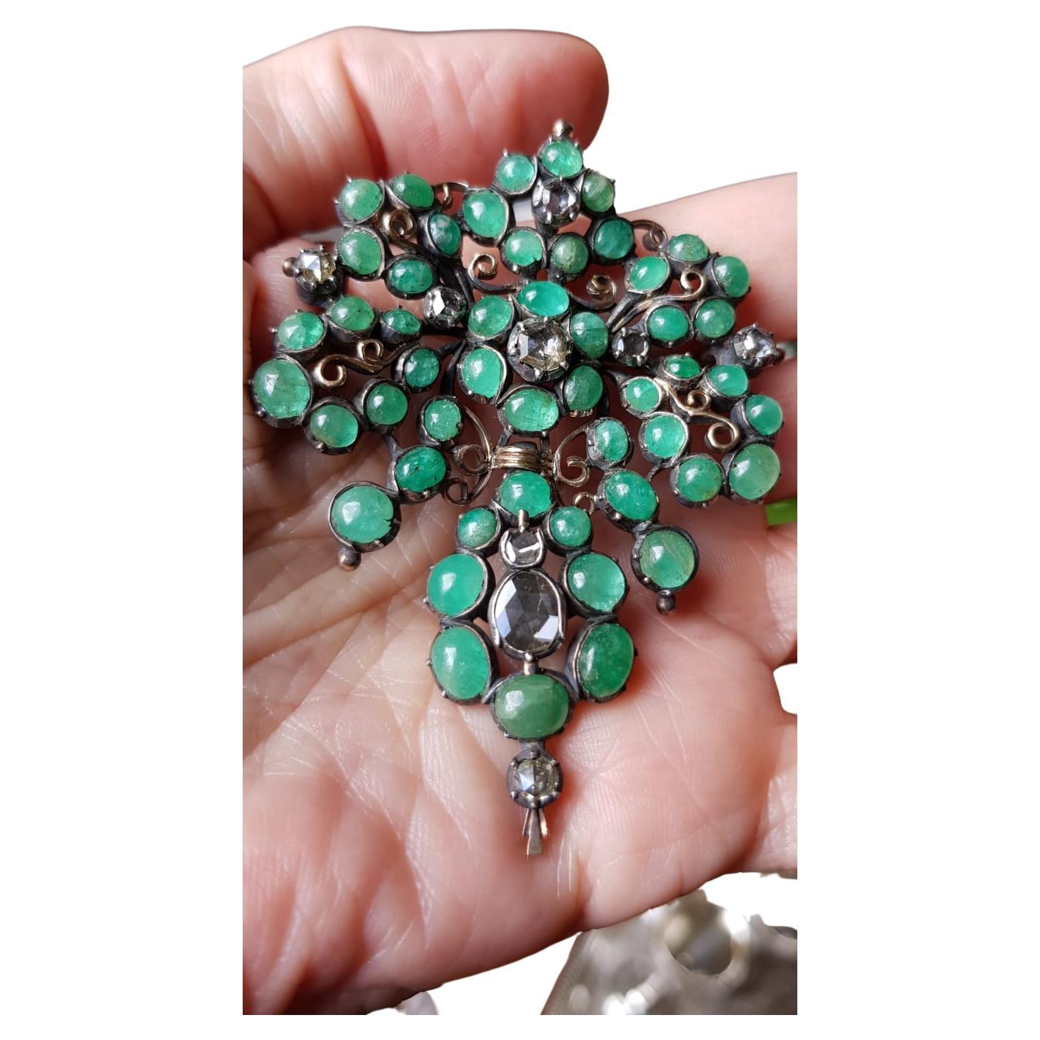 Antique 18Th Century Iberian Emerald Cabochon & Rose-Cut Diamond Pendant/Brooch Stomacher.
Impressive 18Th Century Iberian (most probably Spanish origin) . Fifty one Cabochon Emerald  weighing approx. 20 carat and Rose-Cut Diamond  approx. 3.5