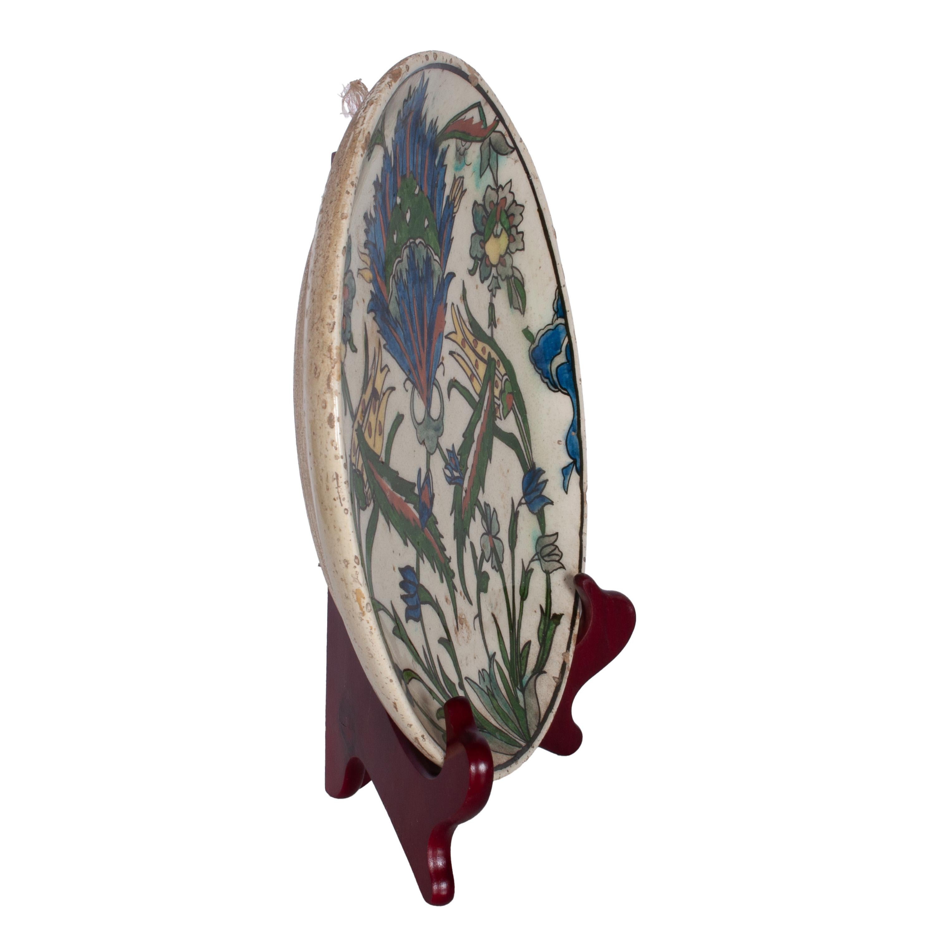 Turc Ancienne assiette en poterie Iznik Kutayha Ottomane Islamique du 18ème siècle Turquie 1750 en vente