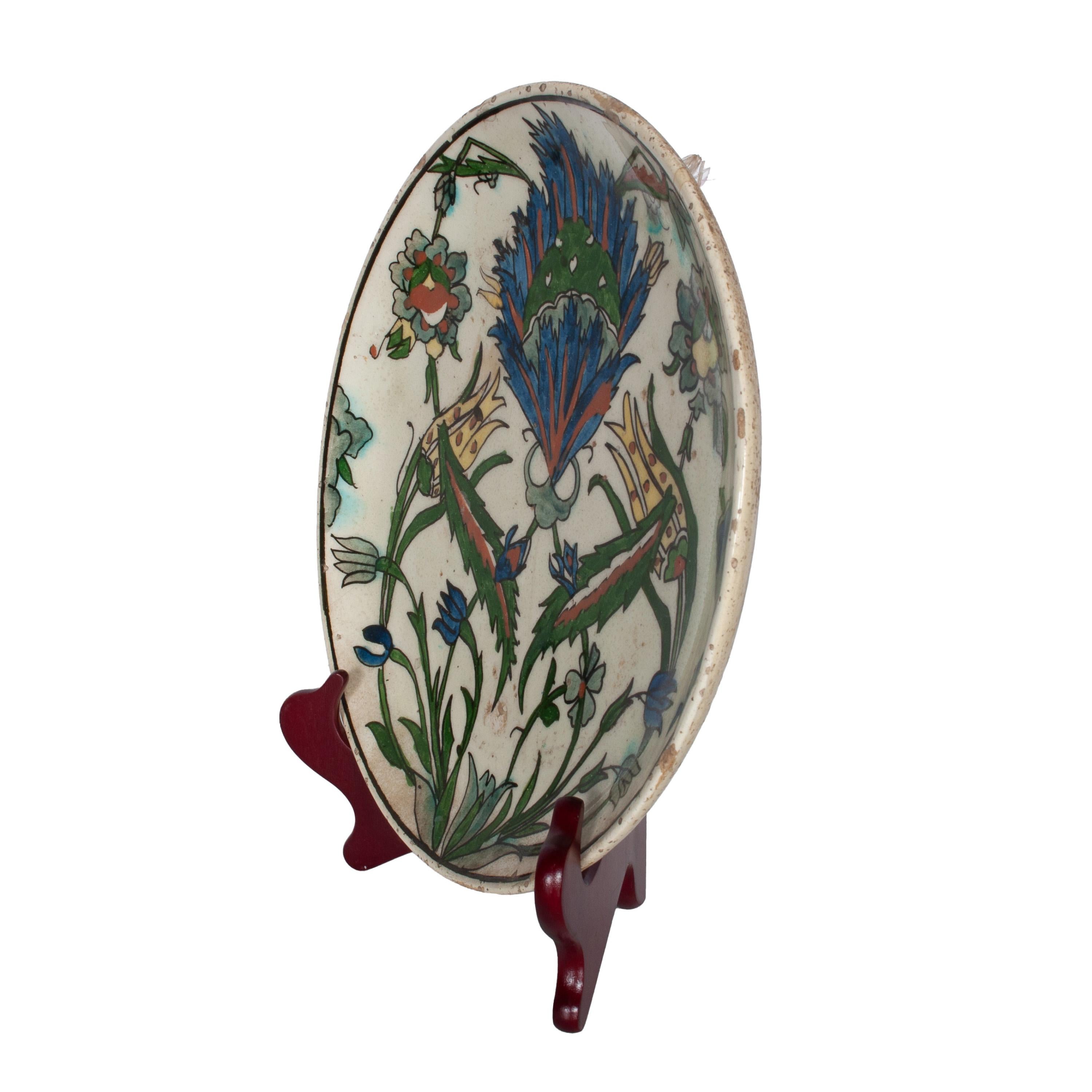 Vernissé Ancienne assiette en poterie Iznik Kutayha Ottomane Islamique du 18ème siècle Turquie 1750 en vente