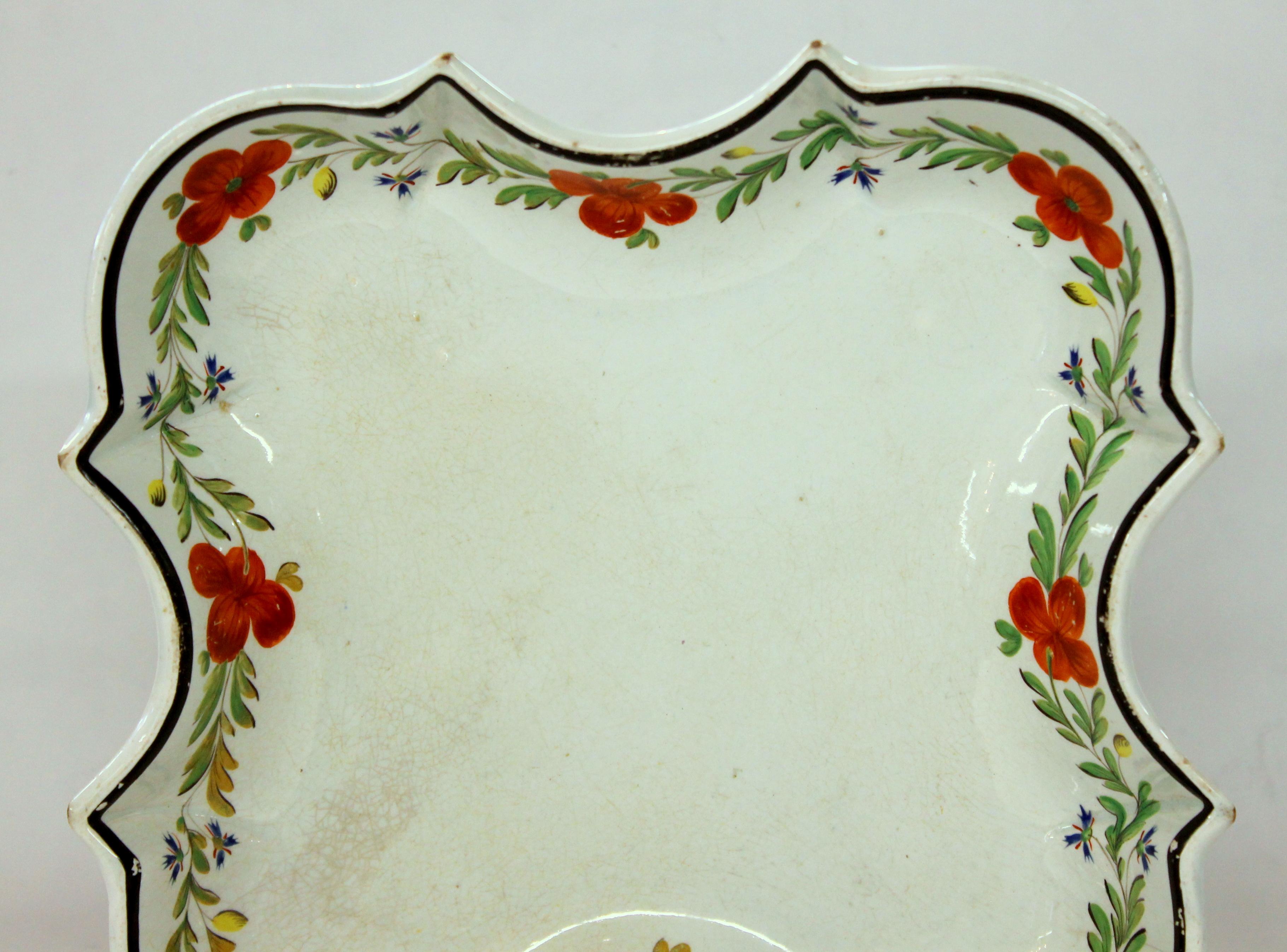 Very rare antique English J. and E. Baddeley earthenware shaped dessert dish, Shelton

Shape attributed to J. and E. Baddeley (unmarked)
Shelton, Staffordshire 
(see plate No. 2, pg. 13 of G. Godden's Encyclopedia of British Pottery and
