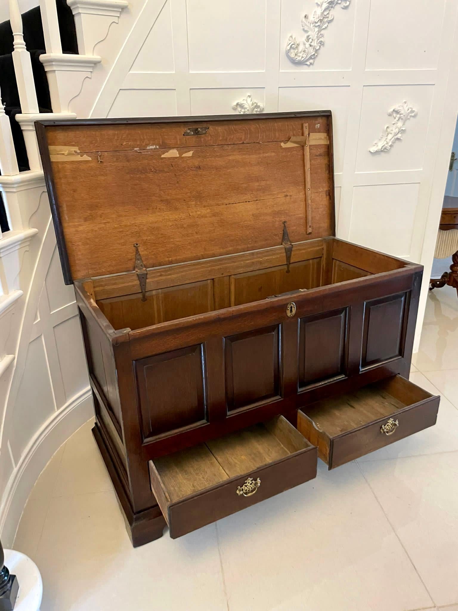 Antique 18th century antique oak mule chest having a lift up lid, original hinges, four lovely panels to the front above two drawers standing on original bracket feet.

An all original 18th century handsome example in lovely condition