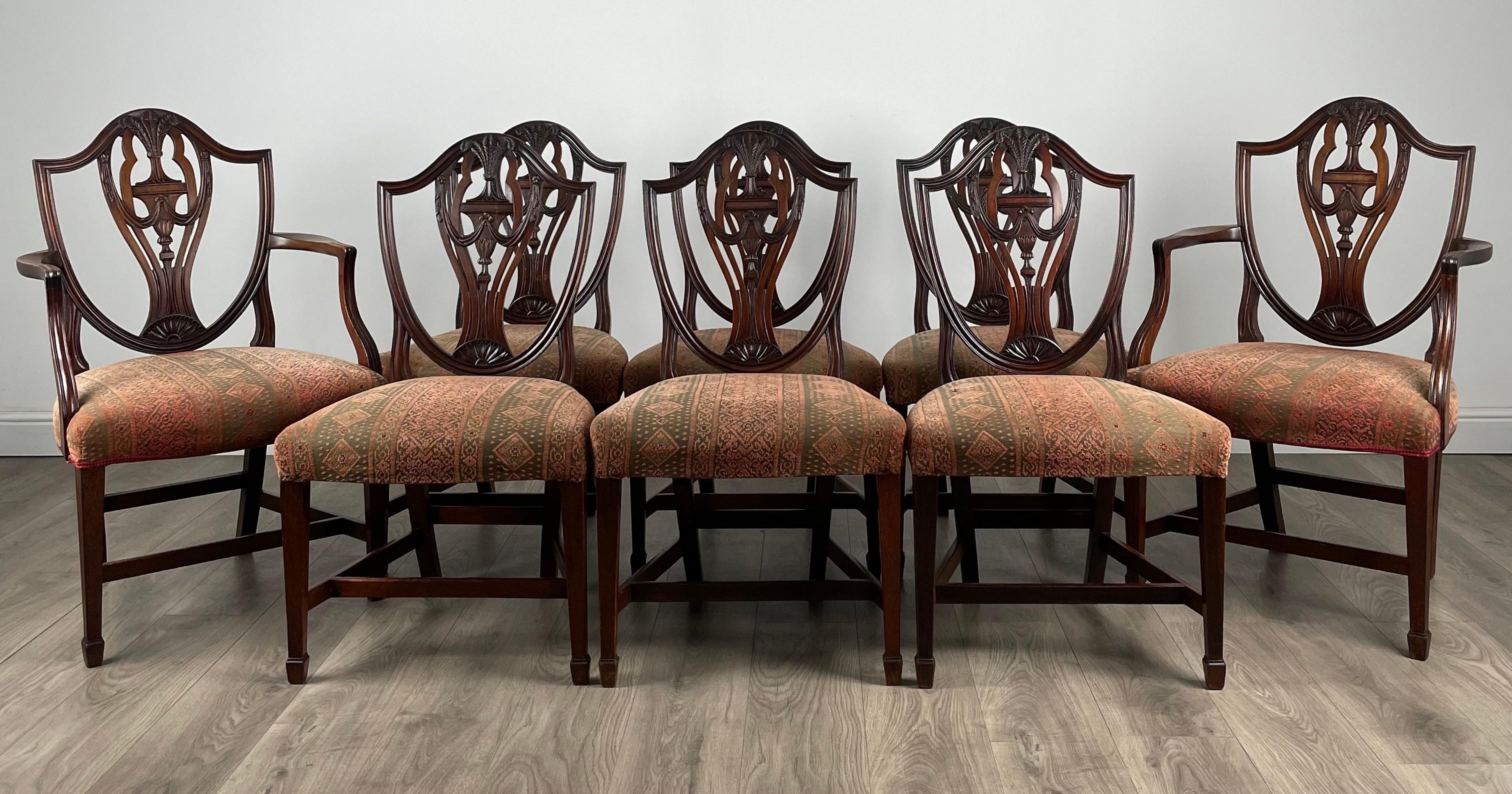 Exclusive Set Of 8 Georgian Shield Back Dining Chairs
In mahogany
The set is consisting of six singles and two carvers all having overstuffed seats upholstered in a light coloured fabric.
Extremely well designed chairs made out of the finest quality