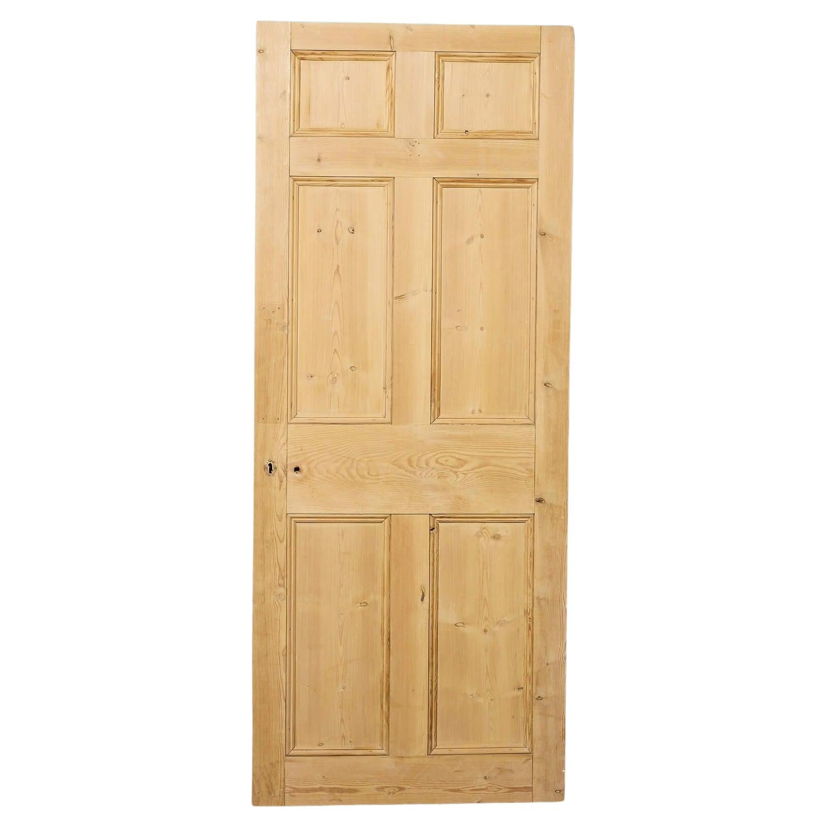 Puerta antigua de pino decapado del siglo XVIII