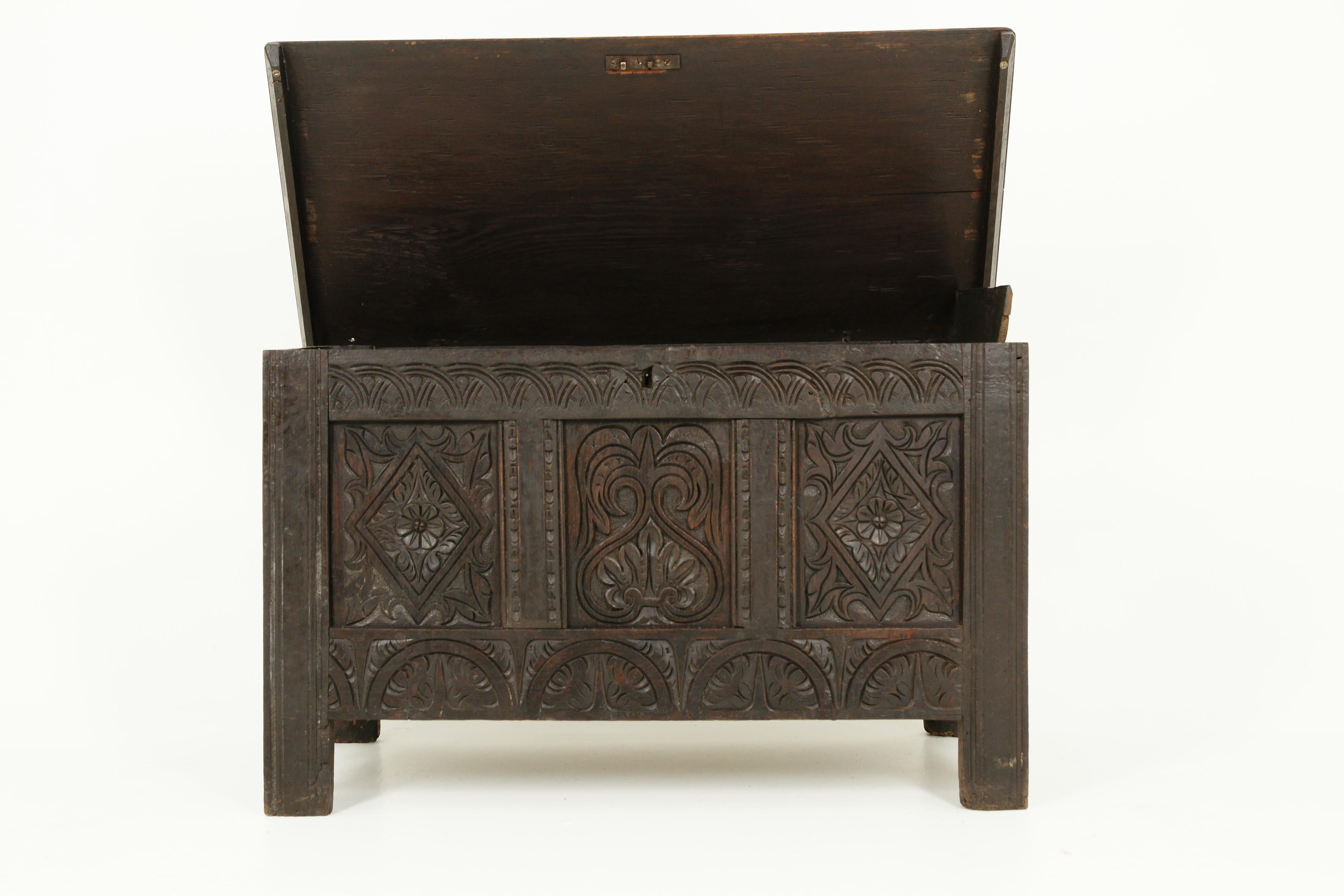 Antique 18th century trunk, carved oak coffer, Scotland 1780, B2371

Scotland, 1780
Solid oak
Original finish
Solid oak moulded top
Lid lifts up and has a large storage compartment
A candle box on the right side
Carved frieze