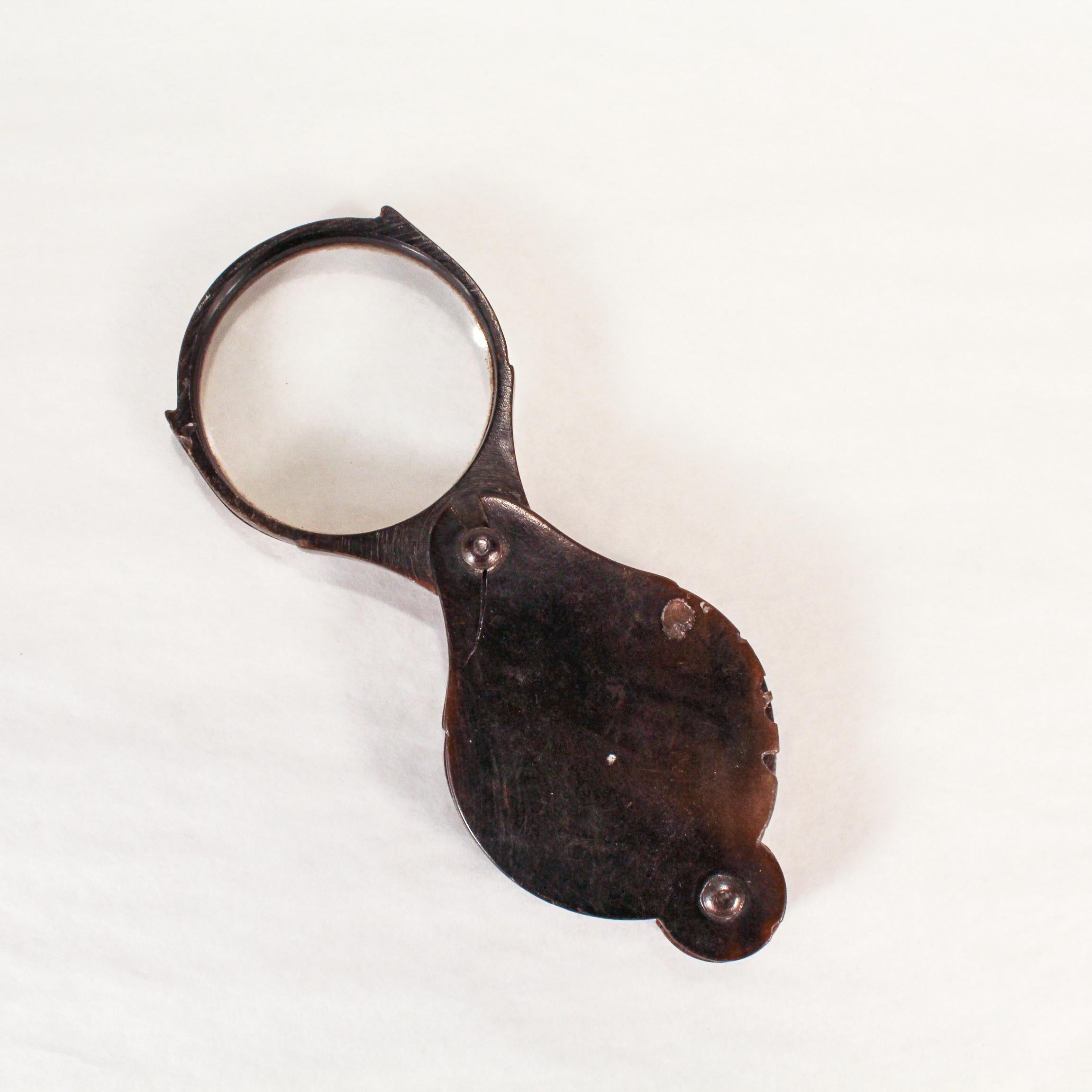 antique folding magnifying glass