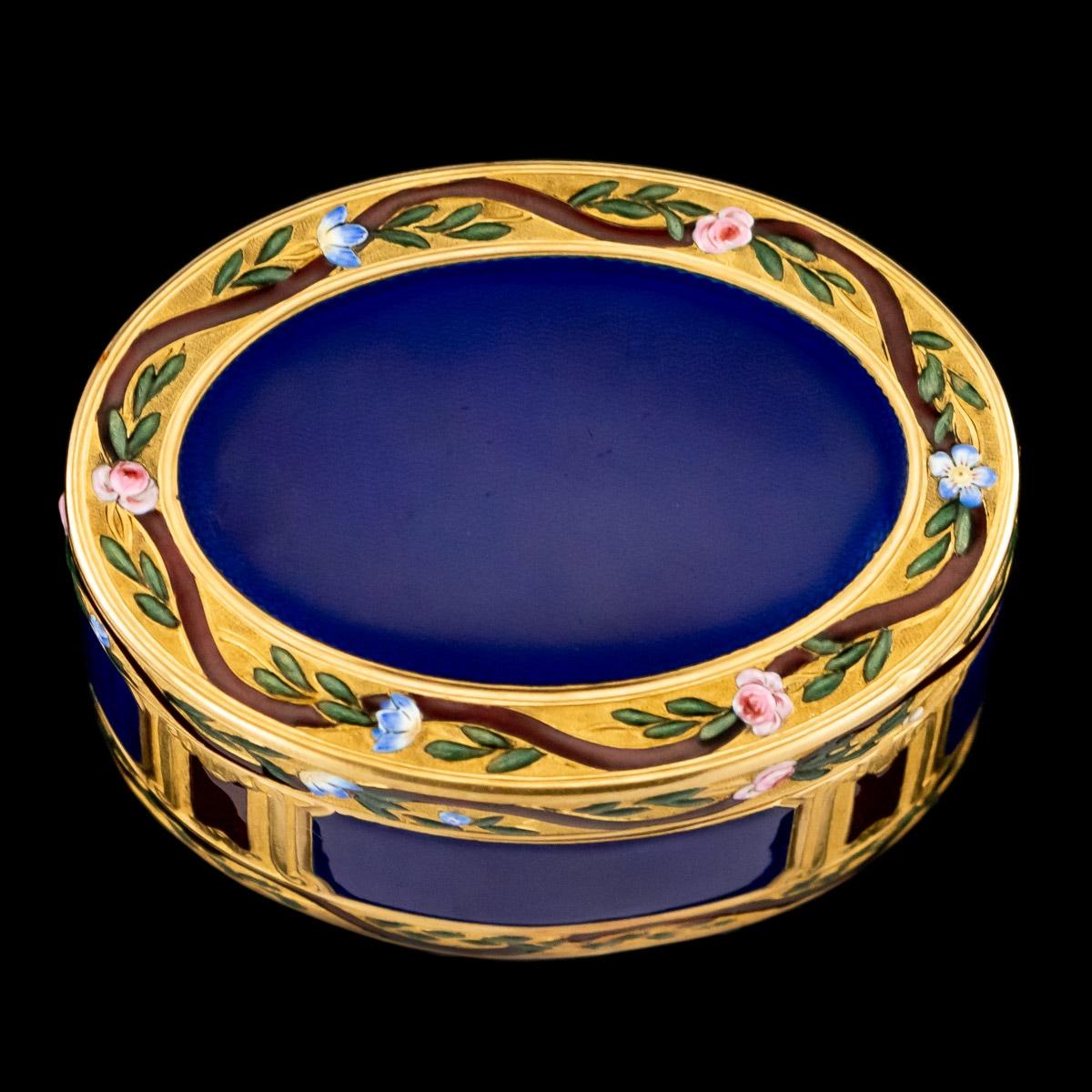 Antique 18th century French 18-karat gold and enamel snuff box, of traditional oval form, the lid, sides and base engine turned and applied with dark blue enamel, within an elaborately chased floral and ribbon boarders. 

Hallmarked with the