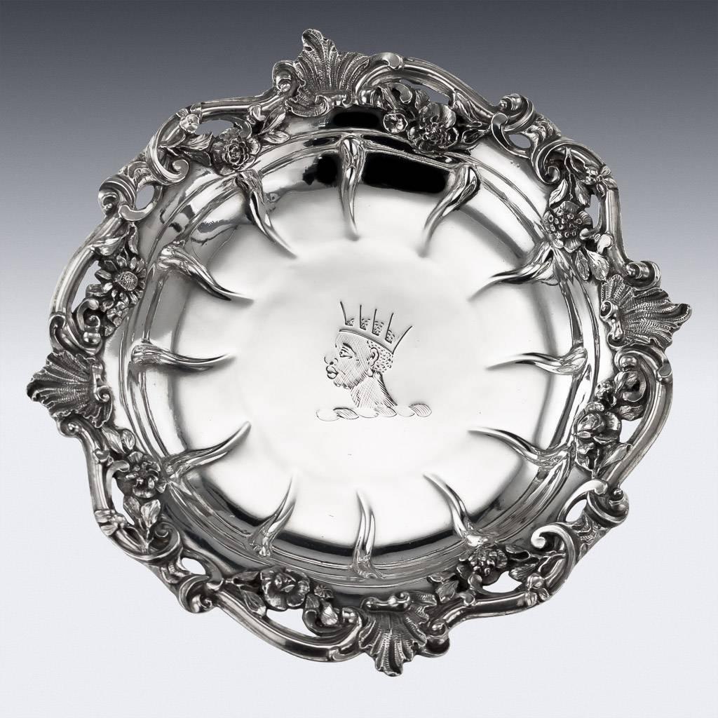 Antique mid-18th century Georgian solid silver set of four decorative sweetmeat dishes, each decorated with realistically modelled rococo floral and shell boarders, the centre is engraved with a distinctive family crest. Bases applied with a