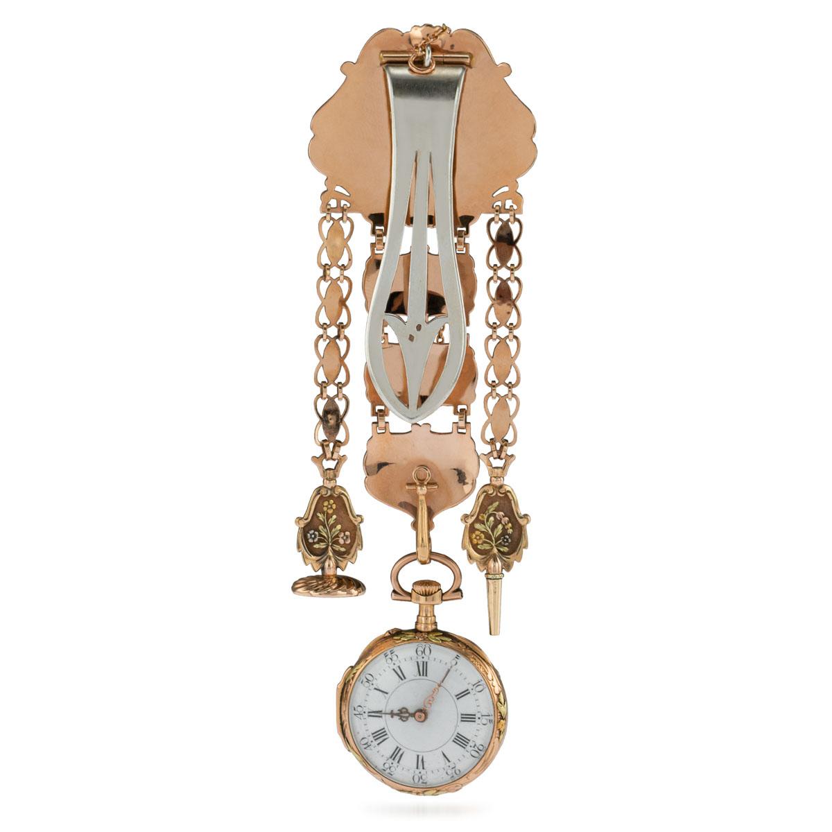 18th century Swiss four-color gold open face watch with the original matching chatelaine, key and seal. Gilt-finished verge movement, finely pierced and engraved scroll decorated balance cock and foot, white enamel dial, Roman numerals, translucent