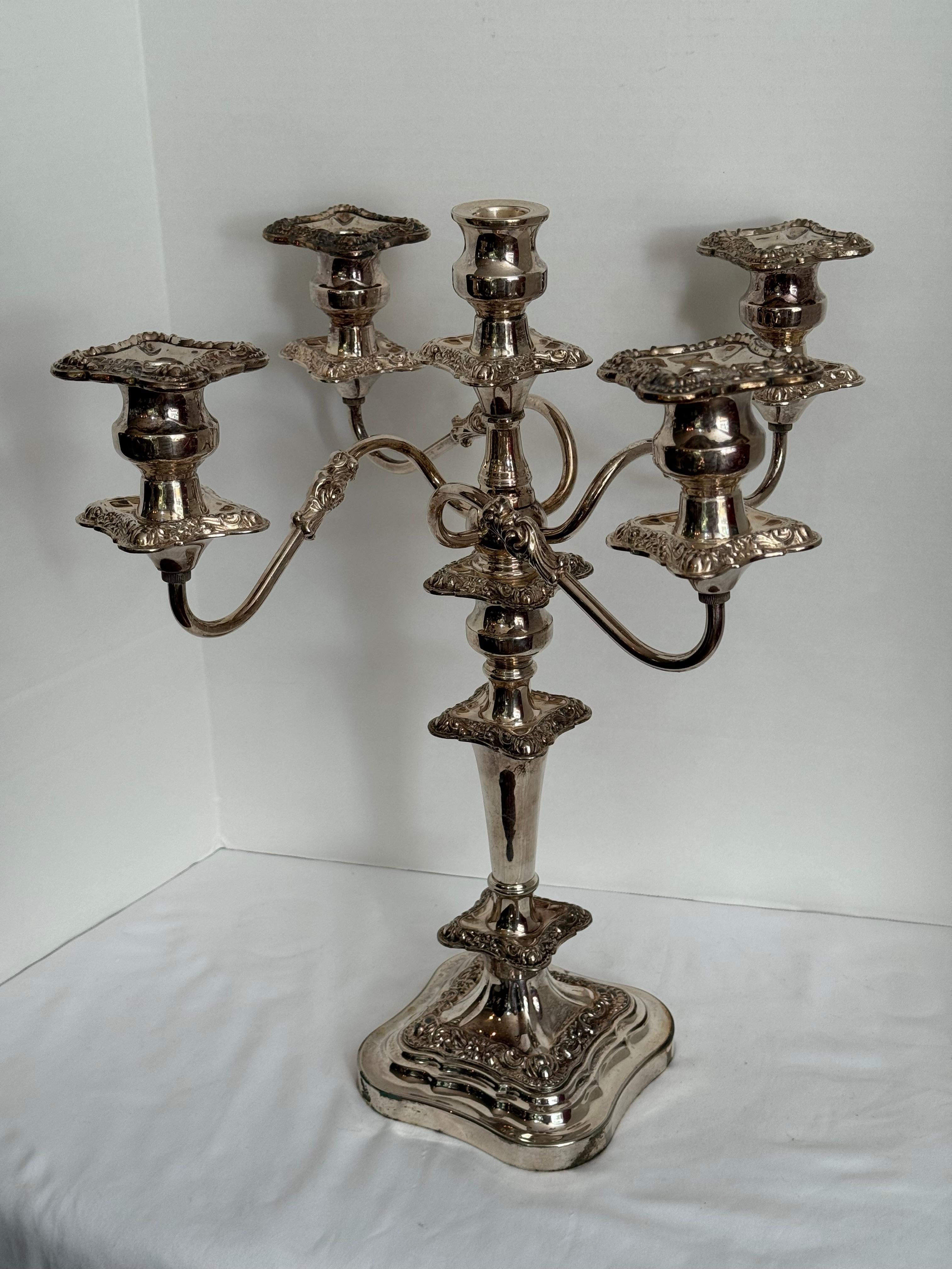 This antique 19 century Sheffield Silver Co. Candelabrum circa.1877.   It will be a great addition to one's collection of Antique Lighting for use & decorative display. 
 & for those seeking a bold and elegant Antique this Silver plate Candelabrum